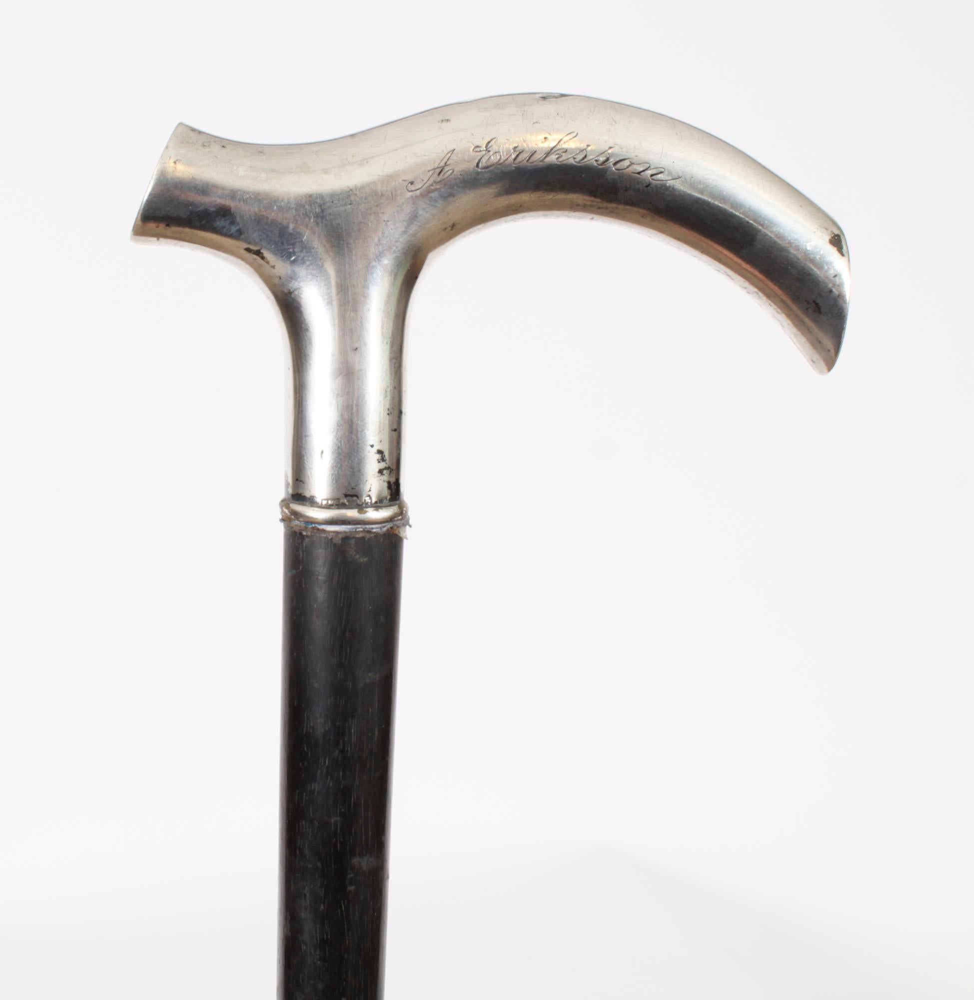 This is a beautiful antique continental silver handled walking stick, circa 1870 in date
  
The striking stick features a silver Crutch handle with rubbed continental hallmarks on the bottom. It is engraved 'A Eriksson' on a gentle tapering ebonized