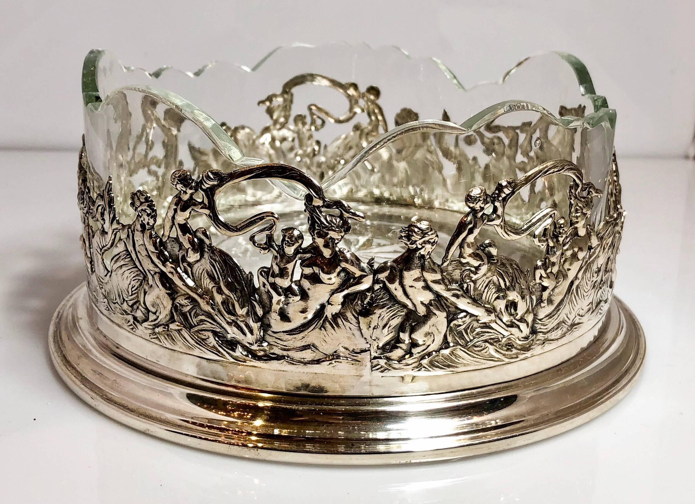 Antique Continental silver wine coaster with crystal liner, circa 1900-1910.