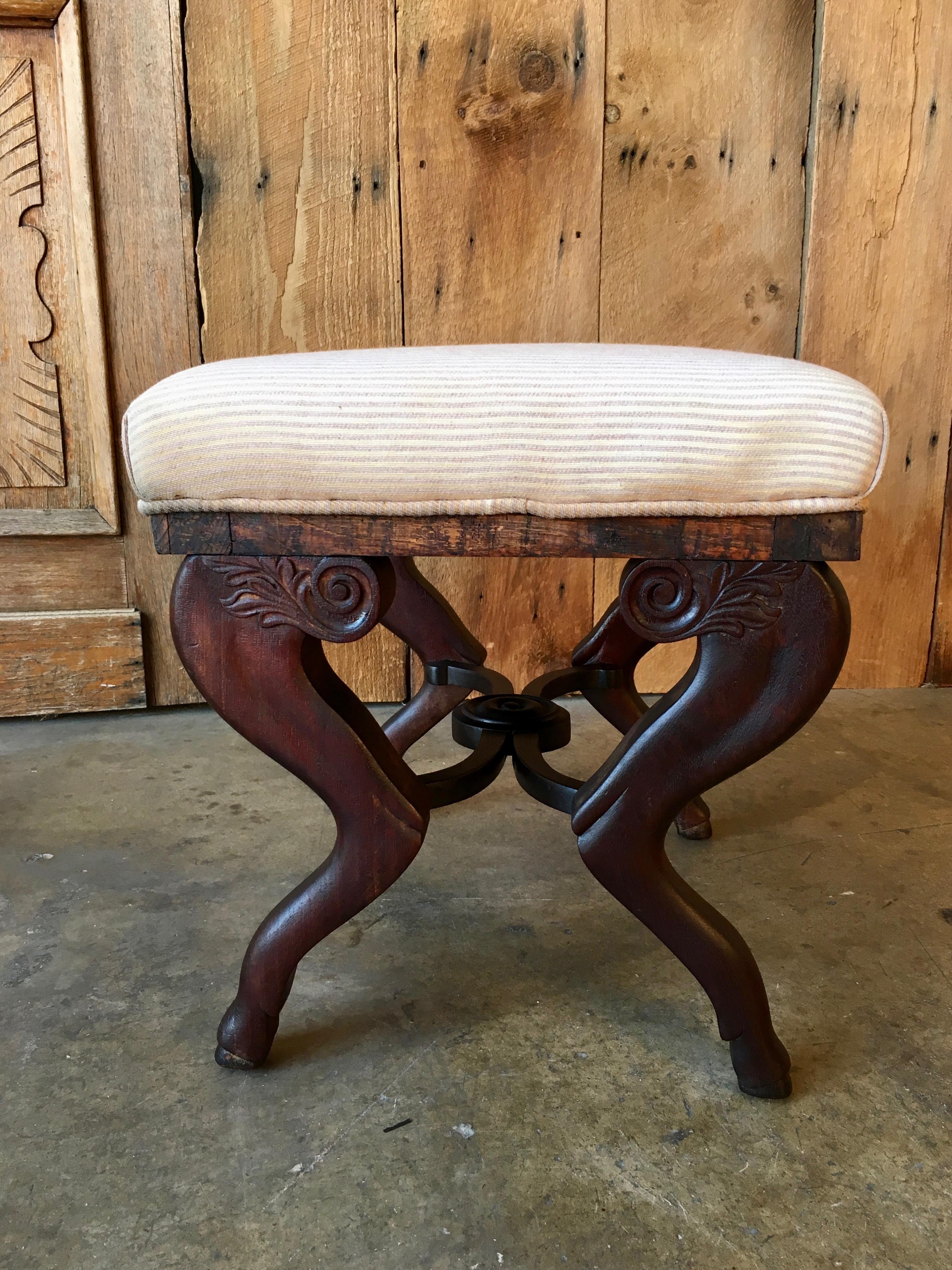 Hand carved mahogany rustic ottoman, circa 1880.