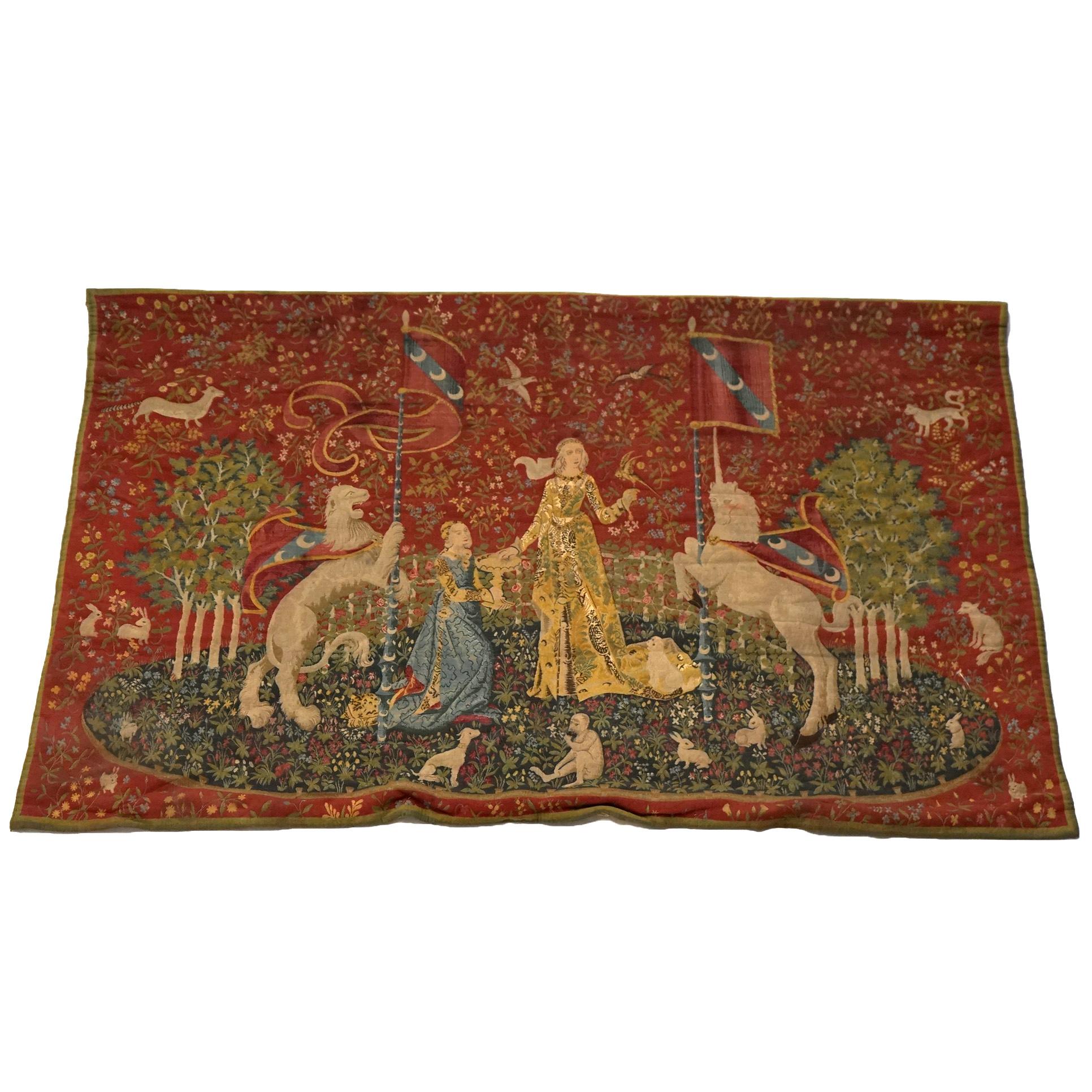 An antique Continental wall tapestry offers The Lady and The Unicorn, Sense of Sight design, 19th century.

Measures- 46.25''H x 67.5''W x .5''D

Historical Note:
The Lady and the Unicorn (French: La Dame à la licorne) is the modern title given