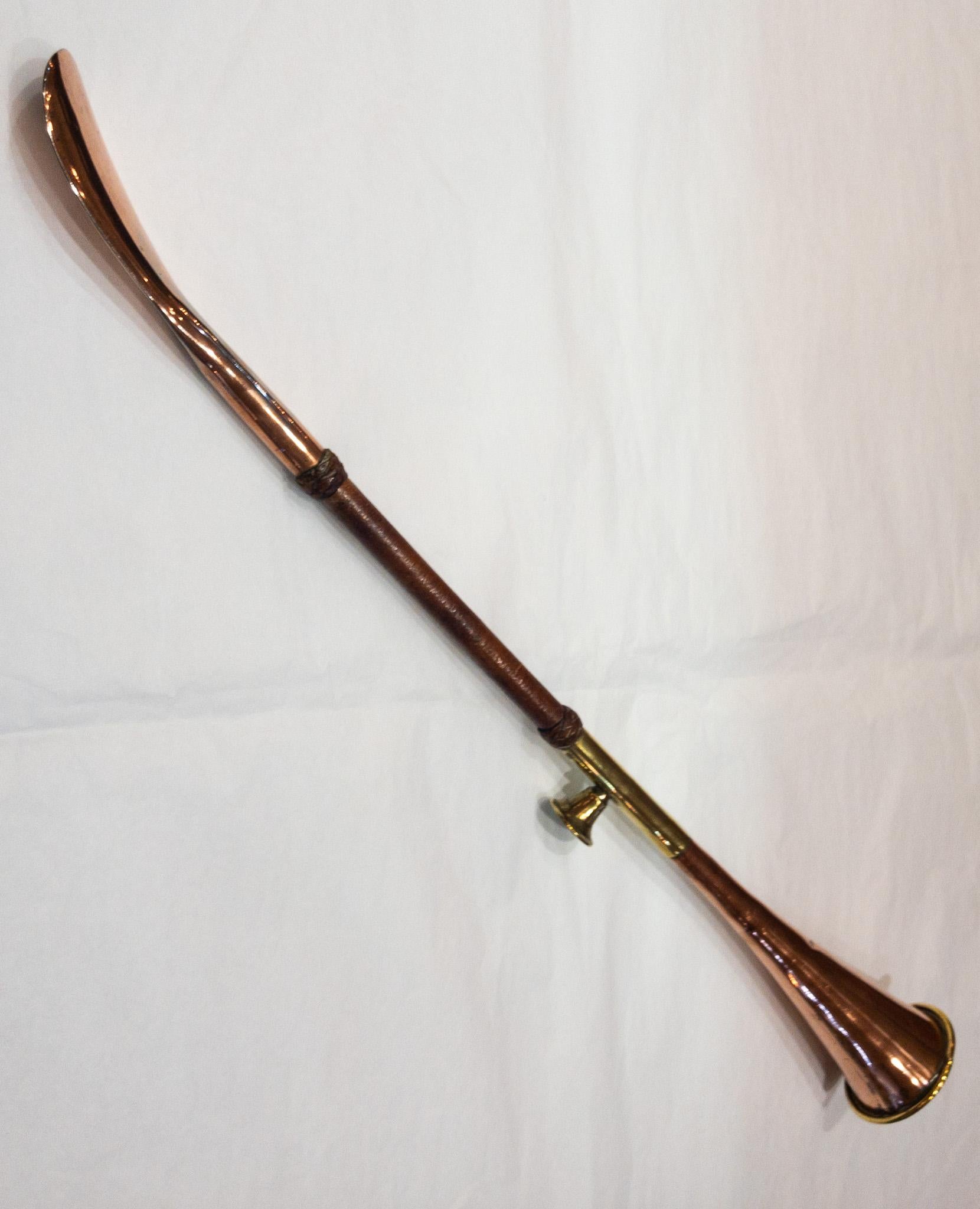 Antique copper brass fox hunt combination musical horn and shoe horn.