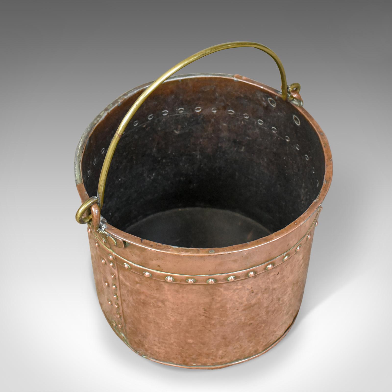 This is an antique copper coal bucket, an English, Victorian, fireside scuttle dating to the mid-19th century, circa 1850.

A pleasing fireside storage bin presented in good antique condition
Suitable for coal, logs and kindling or helpful when