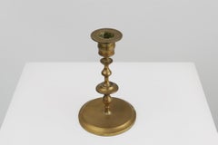 Antique copper Flemish disc candlestick from the 15th century