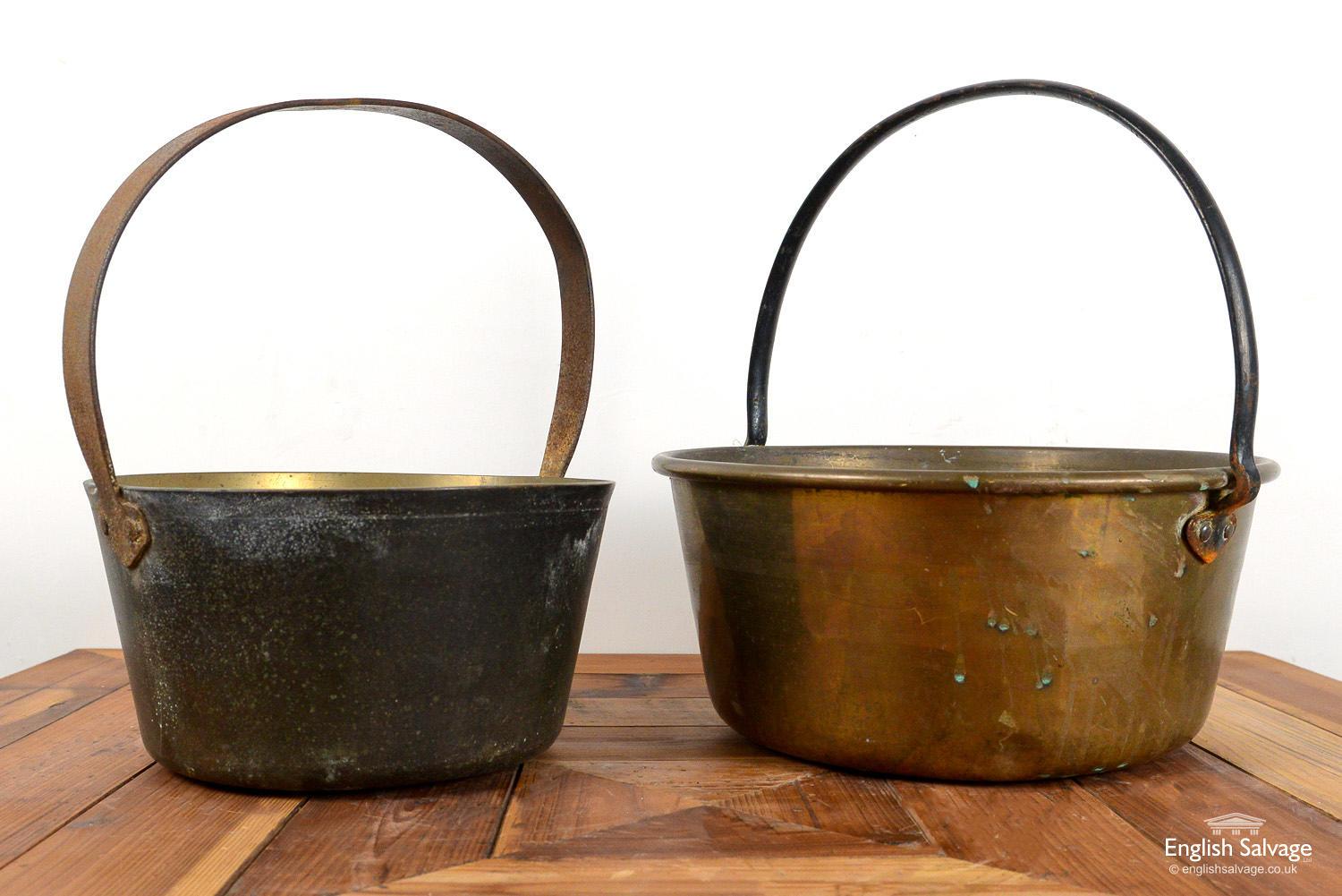The smaller jam pot is 32cm diameter and the larger pot is 35.5cm diameter. Some rust, knocks and tarnishing to both, as expected with age.