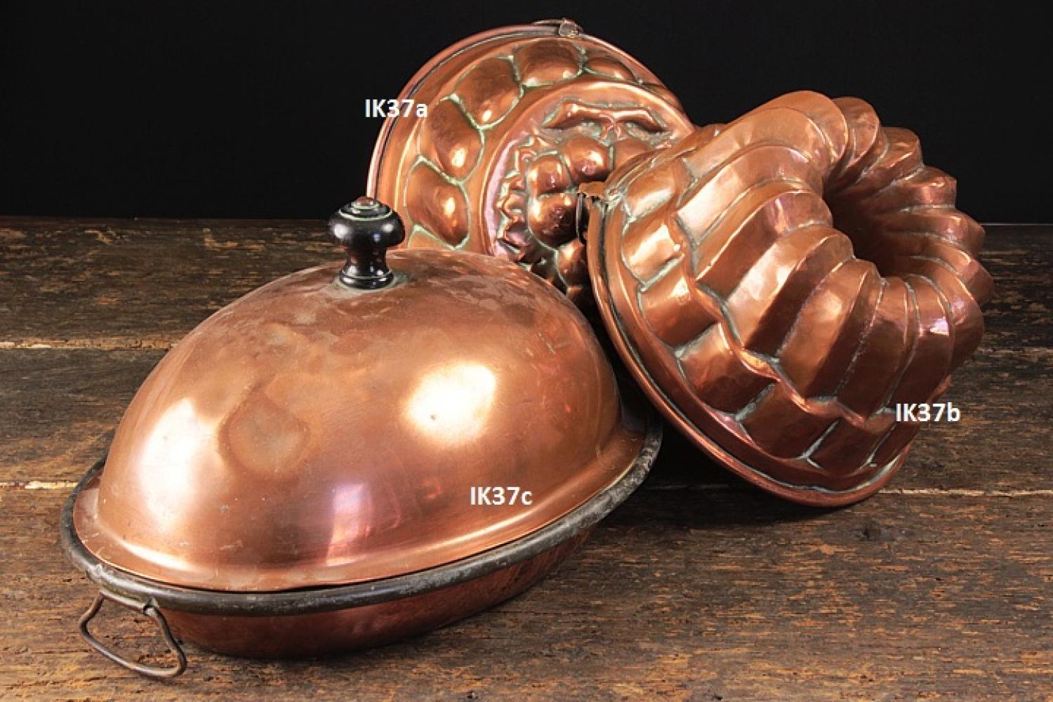 Beautiful old copper moulds and warming pan.
IK37a measures 7¼