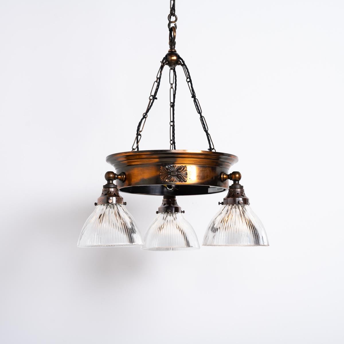 Early 20th Century Antique Copper Ring Chandelier With Prismatic Holophane Glass Shades By Gec For Sale