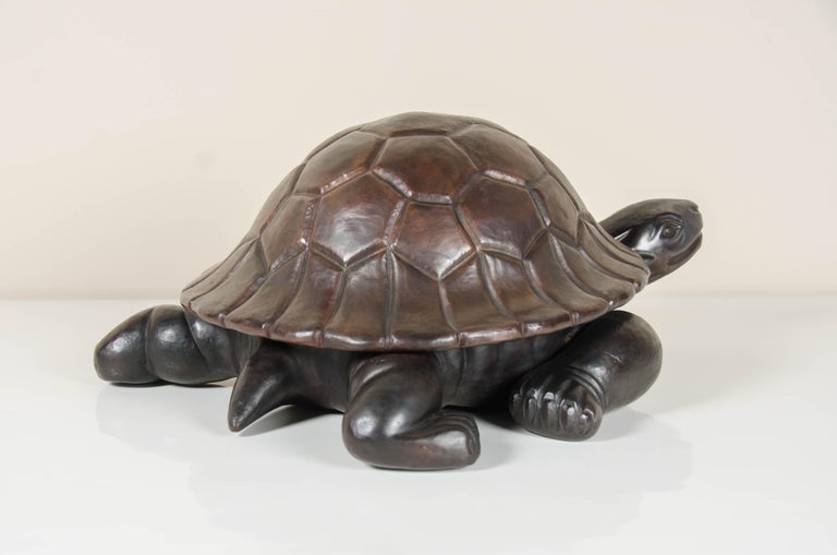 Turtle sculpture
Antique copper
Hand repoussé
Limited edition

Repoussé is the traditional art of hand-hammering decorative relief onto sheet metal. The technique originated circa 800 BC between Asia and Europe and in Chinese historical