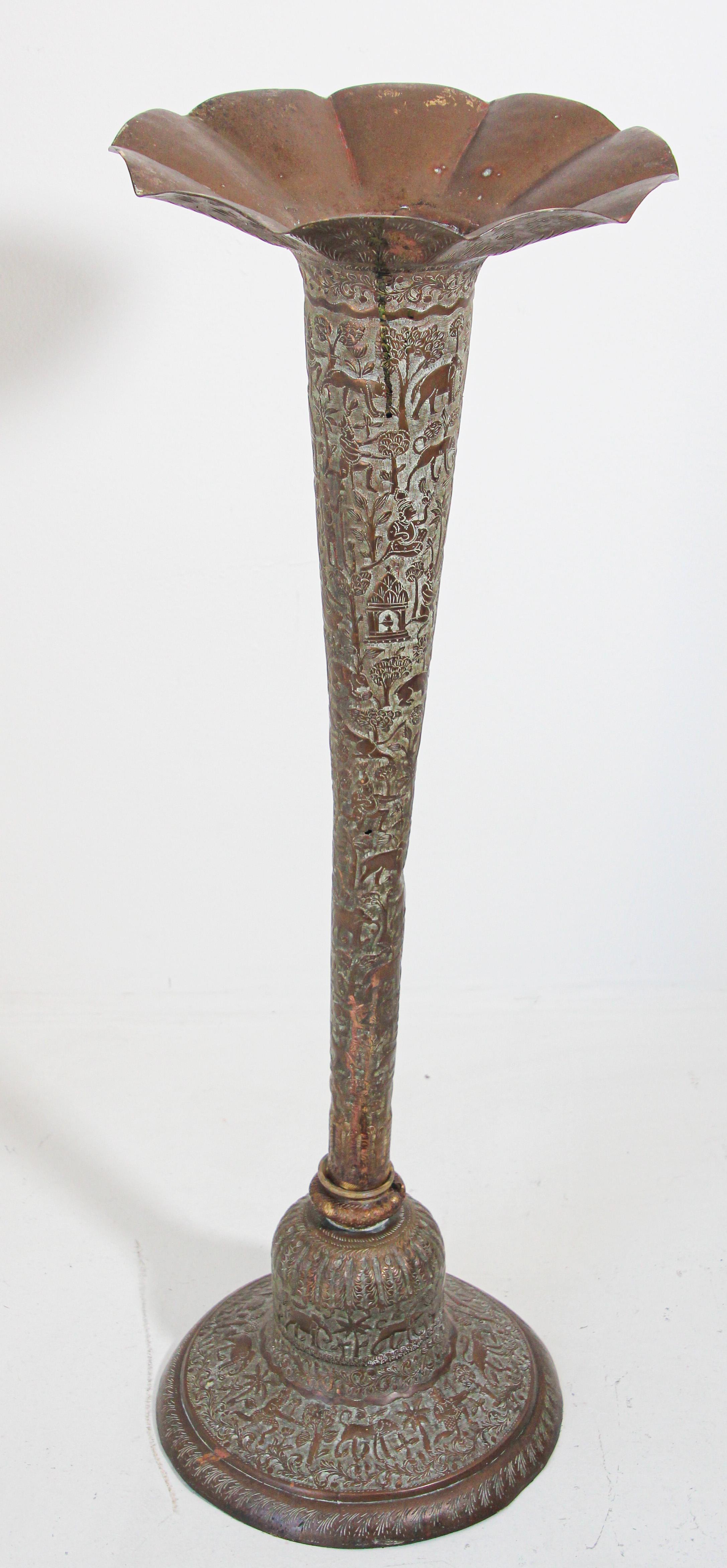 Antique 19th century floor bronzed copper large vase.
Tall brass Indo Persian vase in a trumpet shape.
Handcrafted large sculptural elegant bronzed color metal copper vase.
Delicately handmade and etched, hammered and carved with very Fine