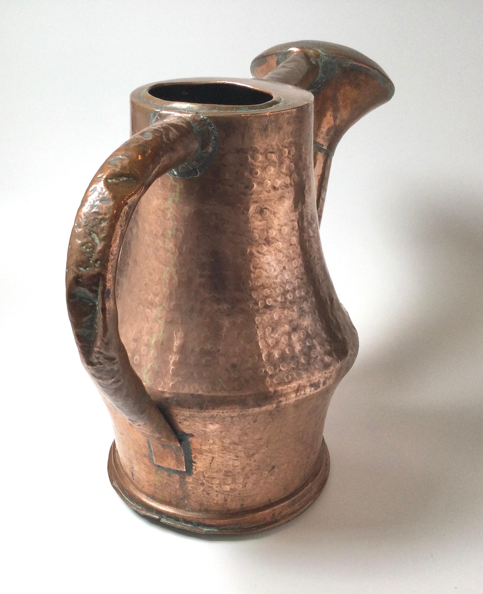 antique watering can