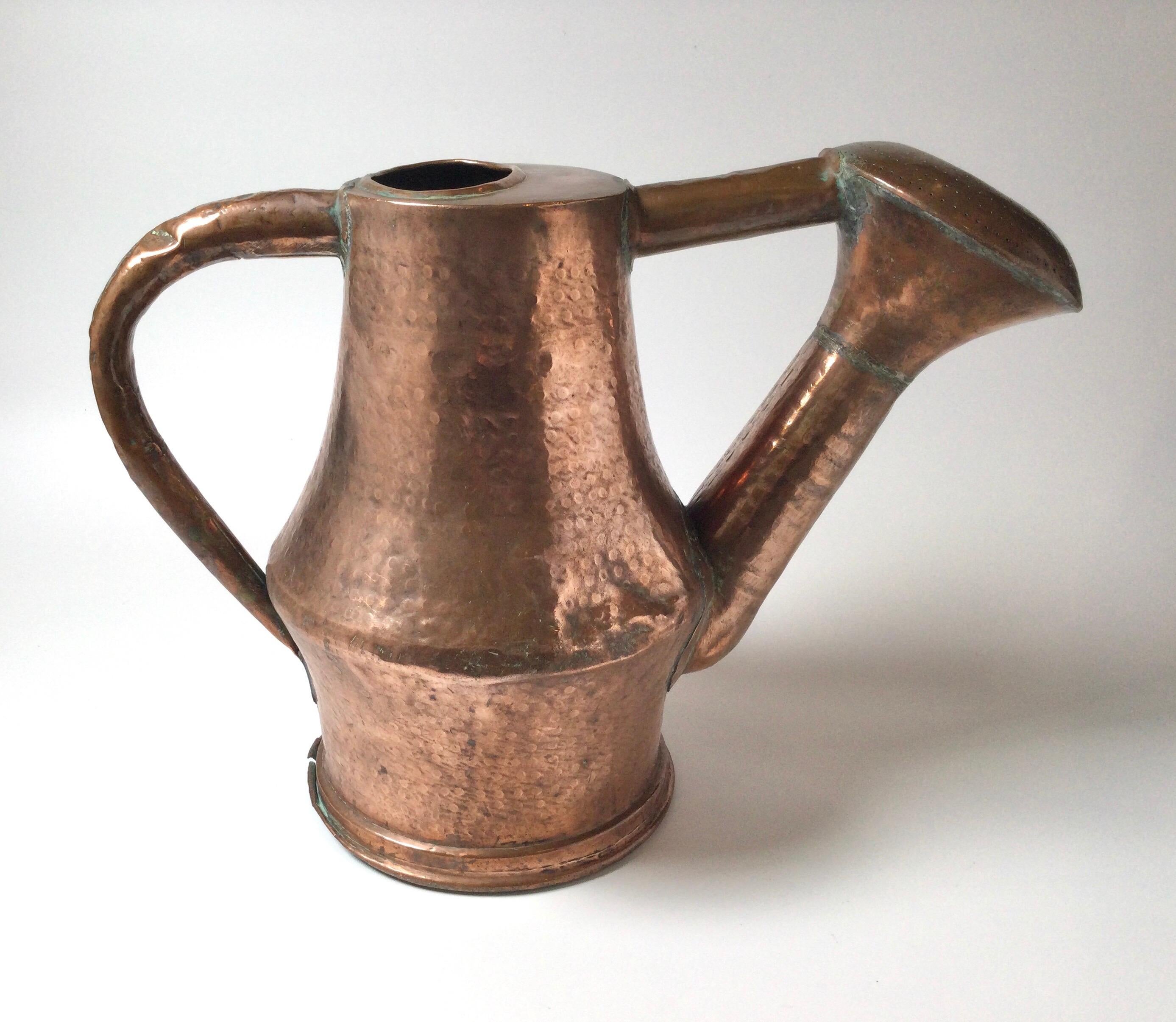 large copper watering can