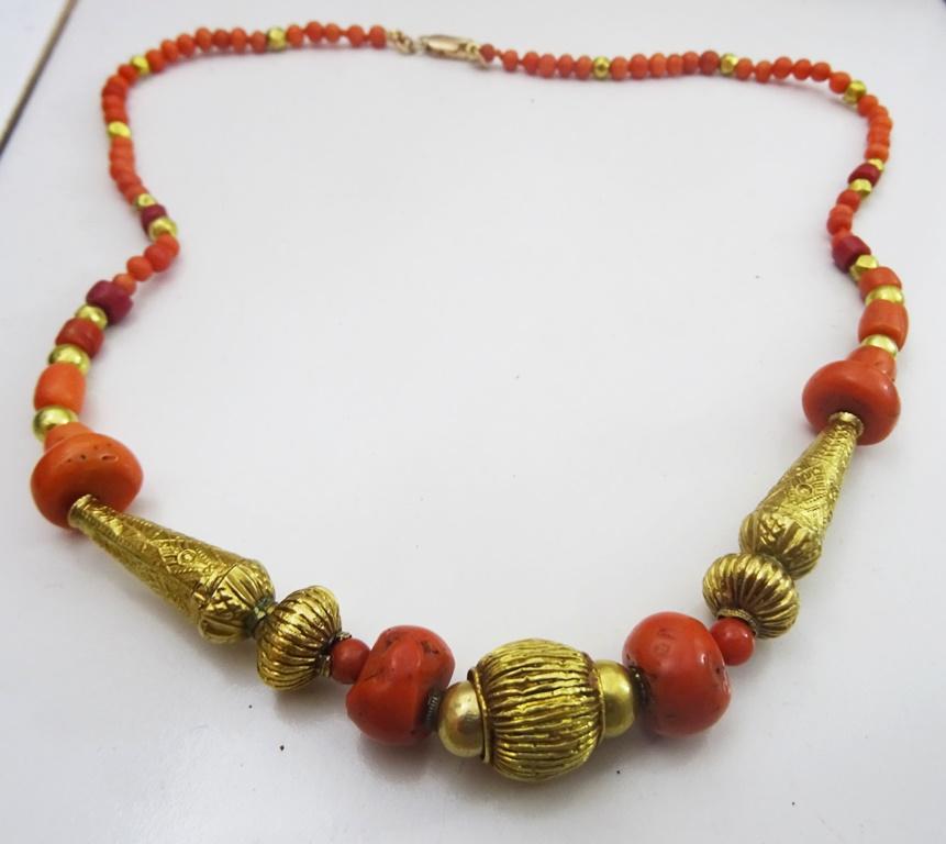 In our Jerusalem workshop we utilize the materials that come into our hand to create unique beaded Necklaces.
Here we have used Round Sardinian coral beads and various antique Yemenite Corals along with antique 22 karat Gold Pieces from India, to