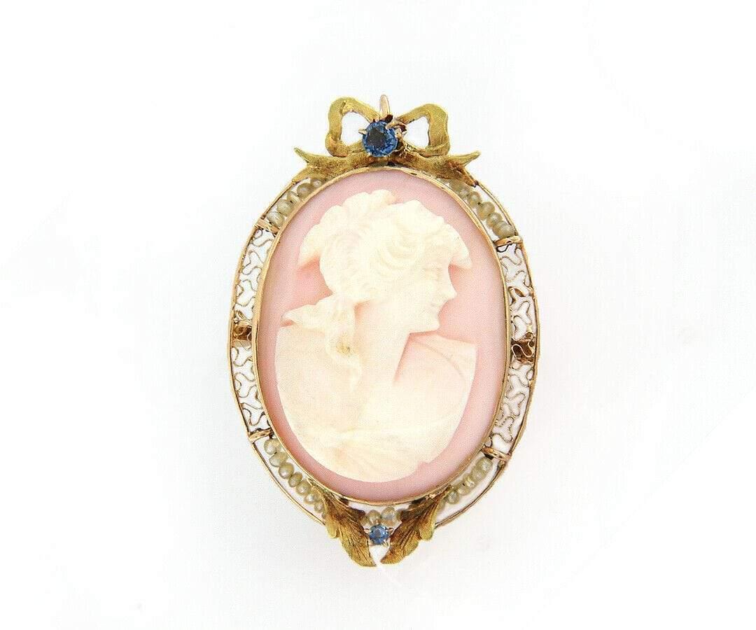 Antique Coral and Pearl Cameo Brooch Pendant in 14K

Antique Coral and Pearl Cameo Brooch Pendant
10K Yellow Gold
Pendant Dimensions: Approx. 27.0 X 40.0 MM
Weight: Approx. 8.60 Grams
Stamped: 10K

Condition:
Offered for your consideration is a