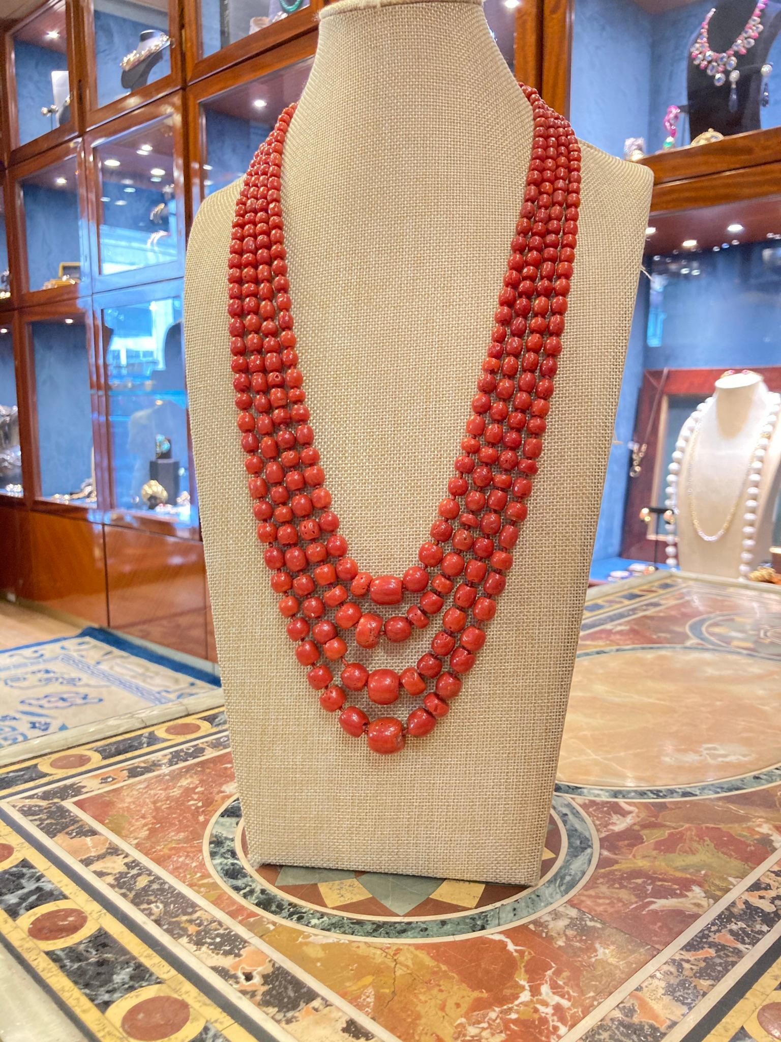 A beautiful antique necklace comprised of several strands of coral beads. Made in Italy, circa nineteenth century.