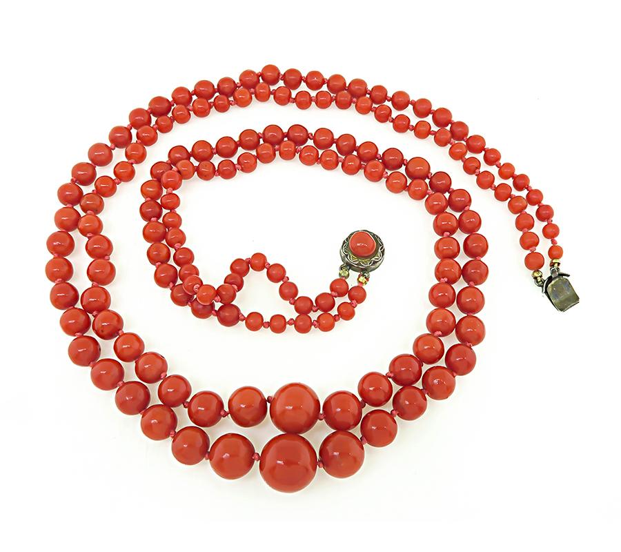 This is a stunning coral beads silver necklace from the Victorian era. The necklace features 2 strands of lovely coral beads that has a diameter from 5mm to 12mm. The necklace measures 20 1/4 inches in length and weighs 50.4 grams.

Inventory