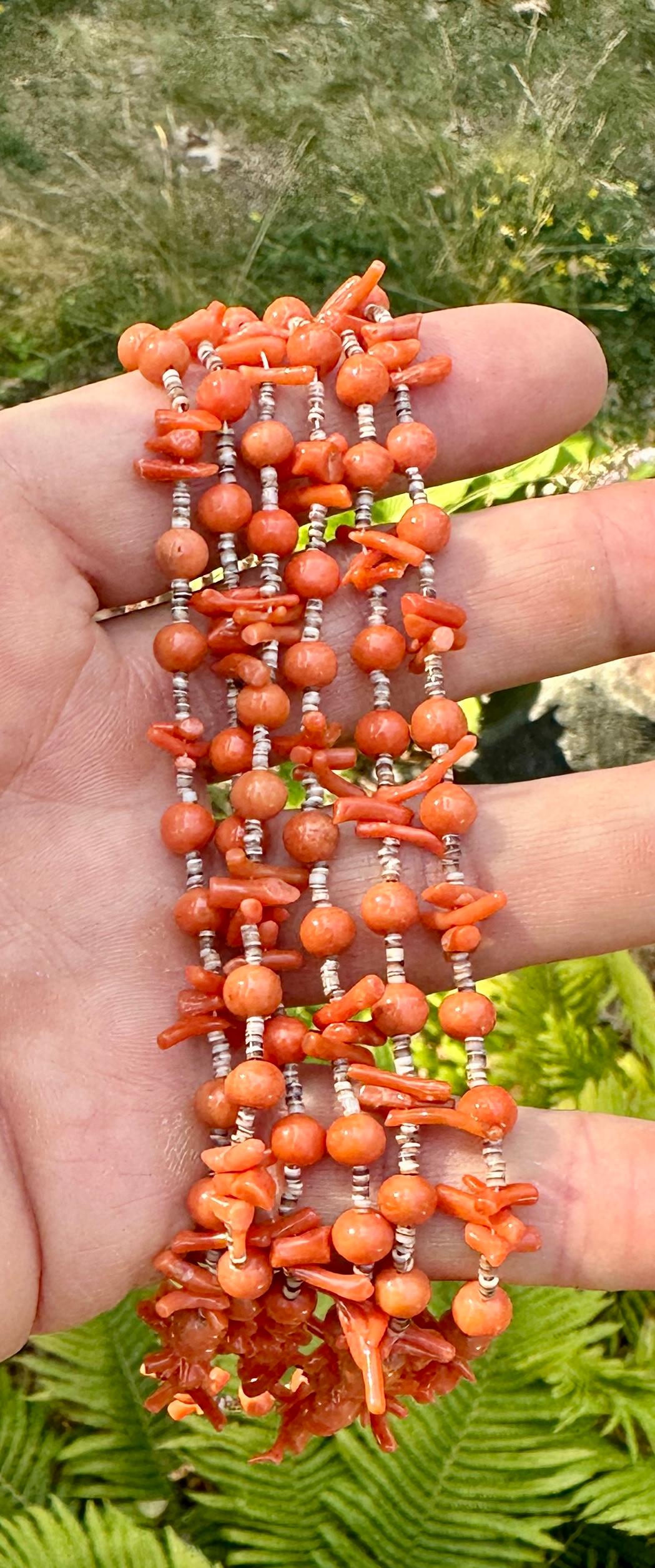 THIS IS A MAGNIFICENT ANTIQUE NATIVE AMERICAN INDIAN RED MOMO CORAL THREE STRAND NECKLACE WITH RARE ROUND CORAL BEADS AND BRANCH CORAL BEADS WITH TINY HEISHI BEADS.  THE VERY RARE HAND MADE NECKLACE IS ABSOLUTELY STUNNING WITH THE GORGEOUS NATURAL