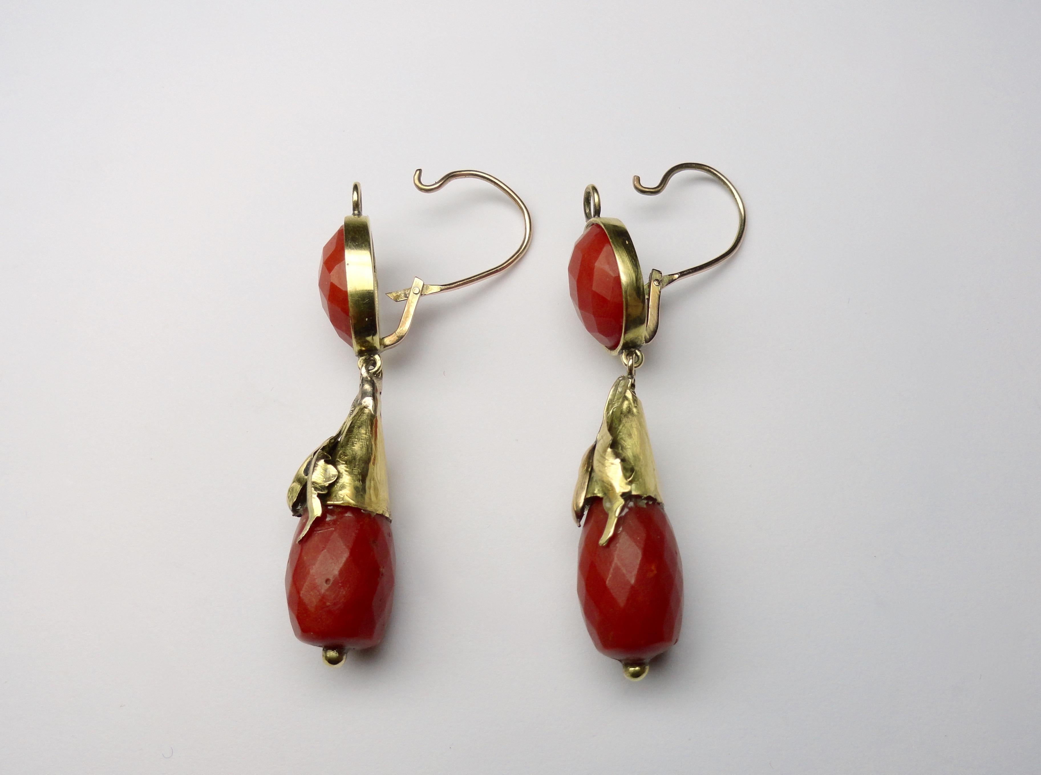 Antique faceted coral pendant earrings mounted in 18KT gold. Mid 19th Century, Italian.