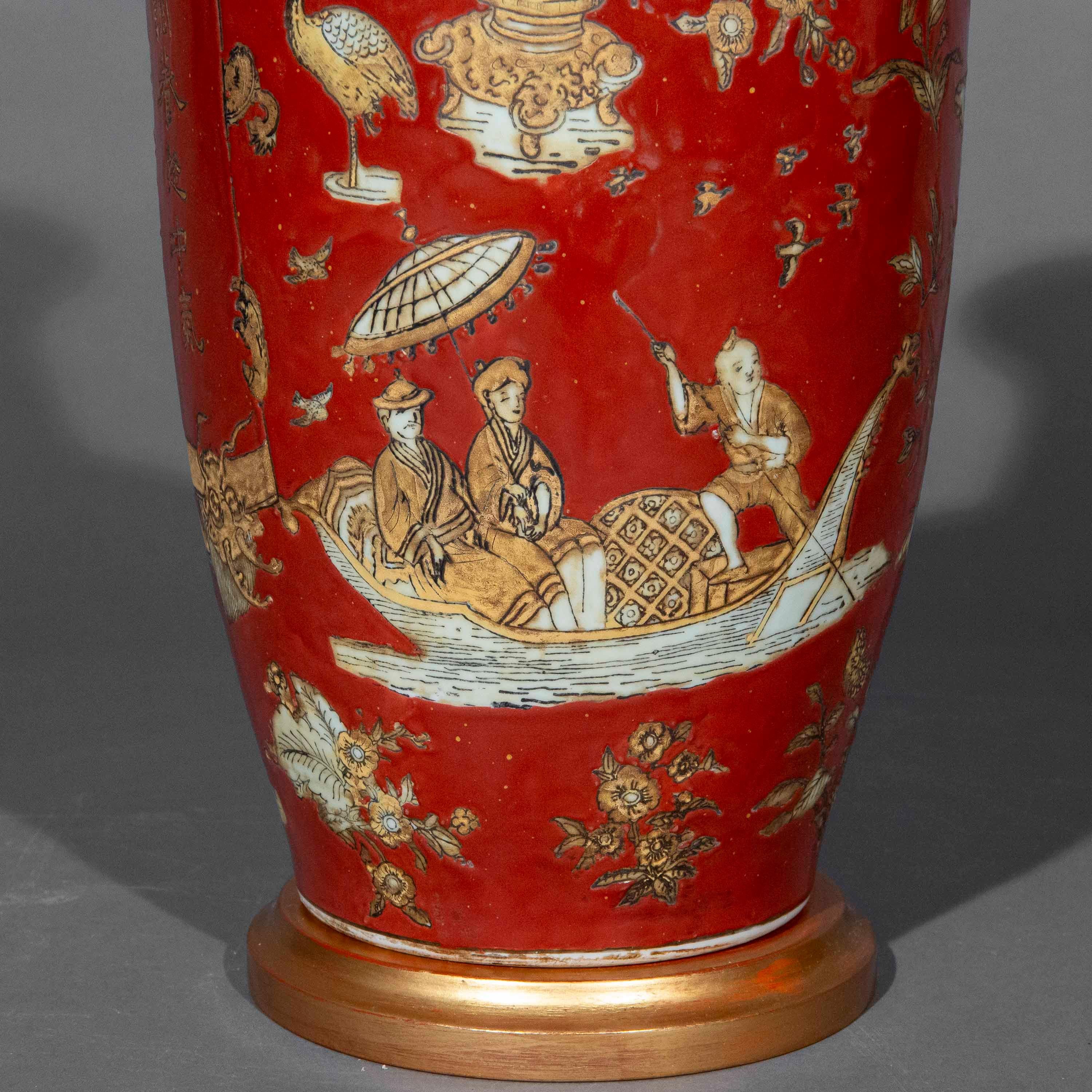 A superbly decorative Chinoiserie vase lamp, meticulously hand-painted with oriental scenes and auspicious symbold on a coral-red ground, in the 18th century style, mounted as lamp on a turned base decorated to match.

Why we like it
We love the