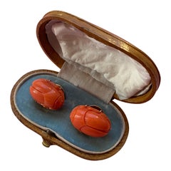 antique coral studs carved as scarabs