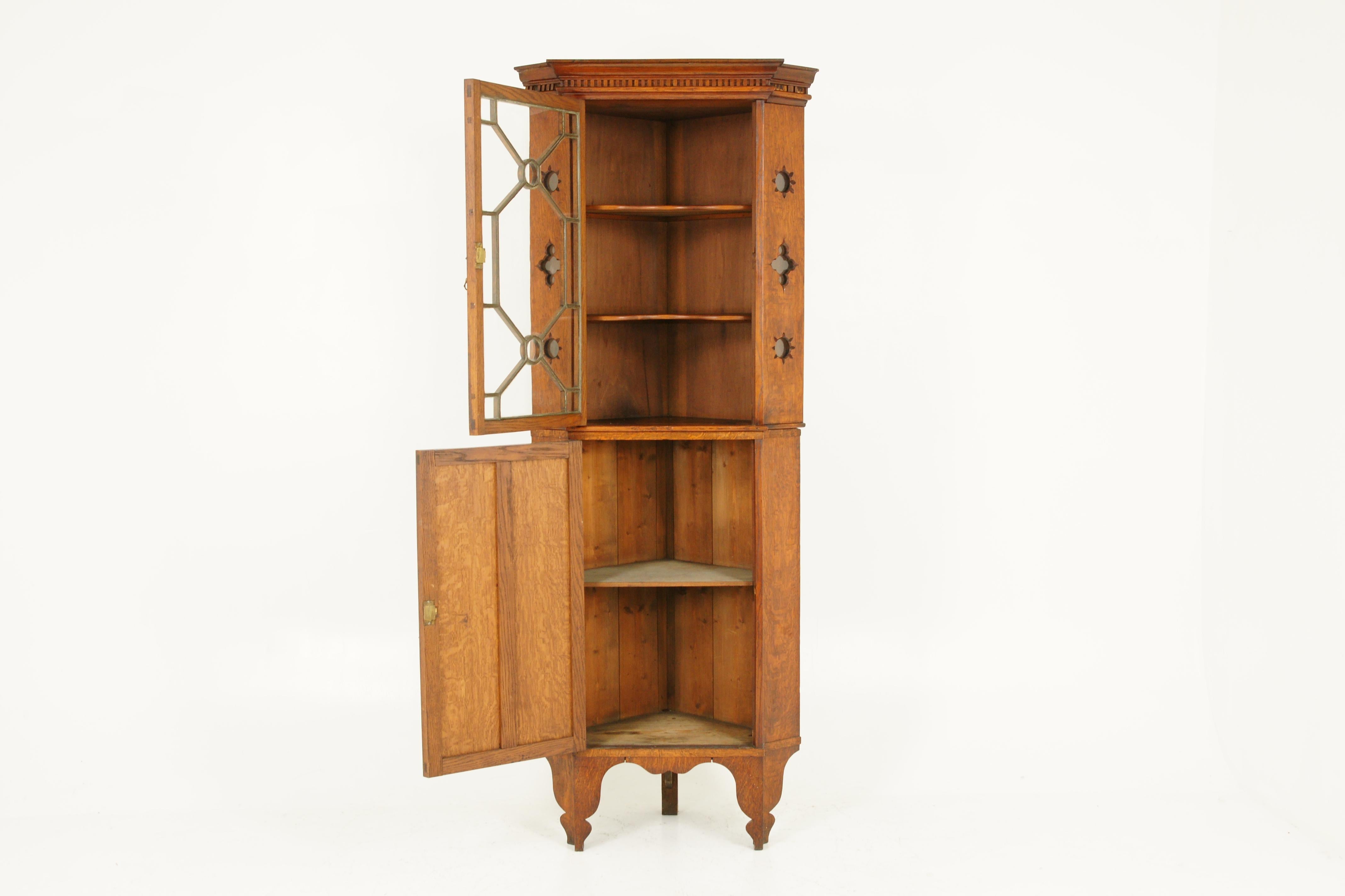 Antique corner cabinet, Arts & Crafts, tiger oak, entryway furniture, B1633

Scotland 1910
Solid tiger oak with original finish
Overhanging dentil cornice above
Single glass door with 15 original glass panes
Original lock and key
Open to reveal a