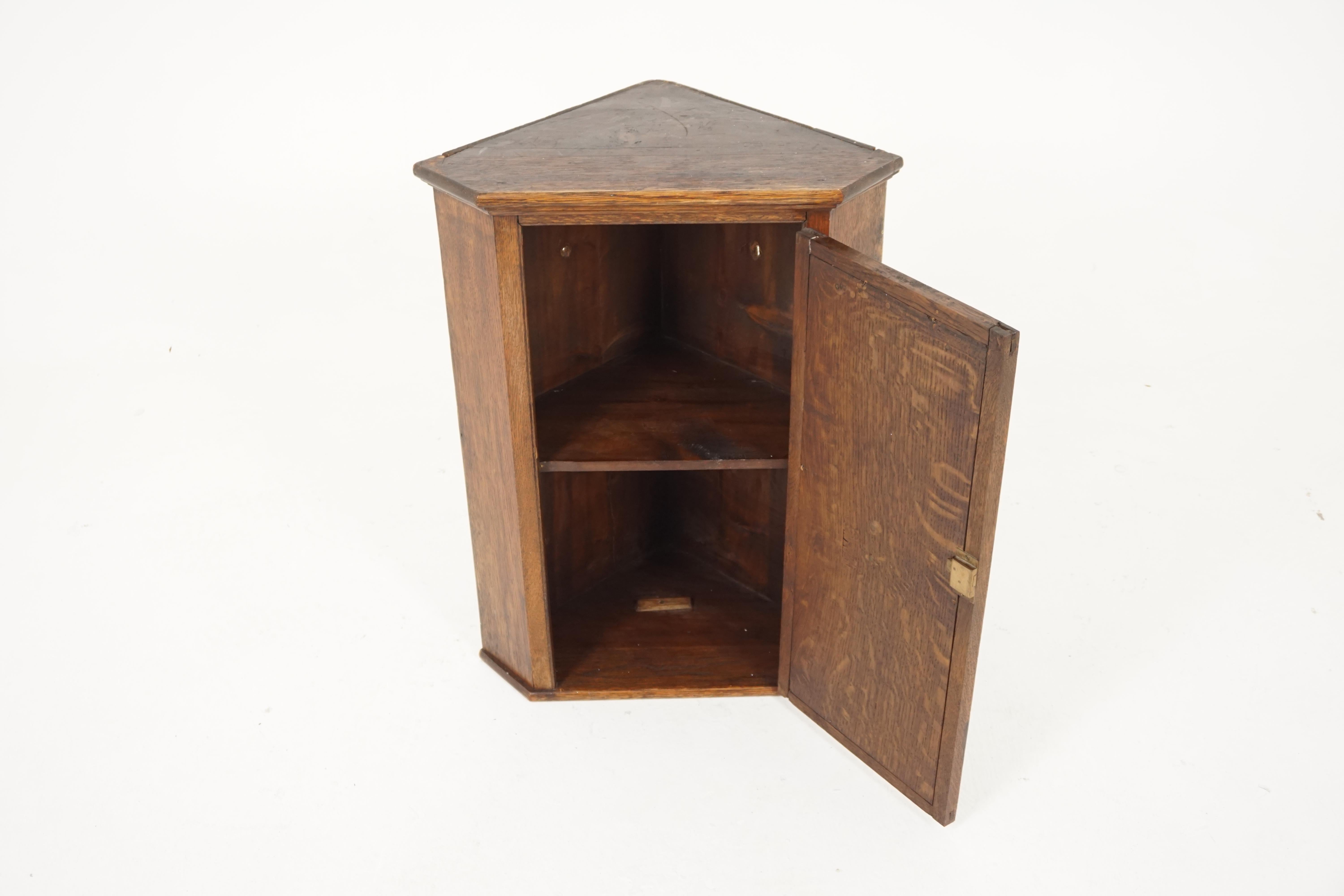 Antique Corner cabinet, Victorian Gothic carved Tiger oak hanging cabinet, Antique Furniture, Scotland 1890, B2014

Scotland 1890
Solid Oak
Original Finish
Solid Oak top
Moulded cornice below
Single heavily carved door to the front
Canted
