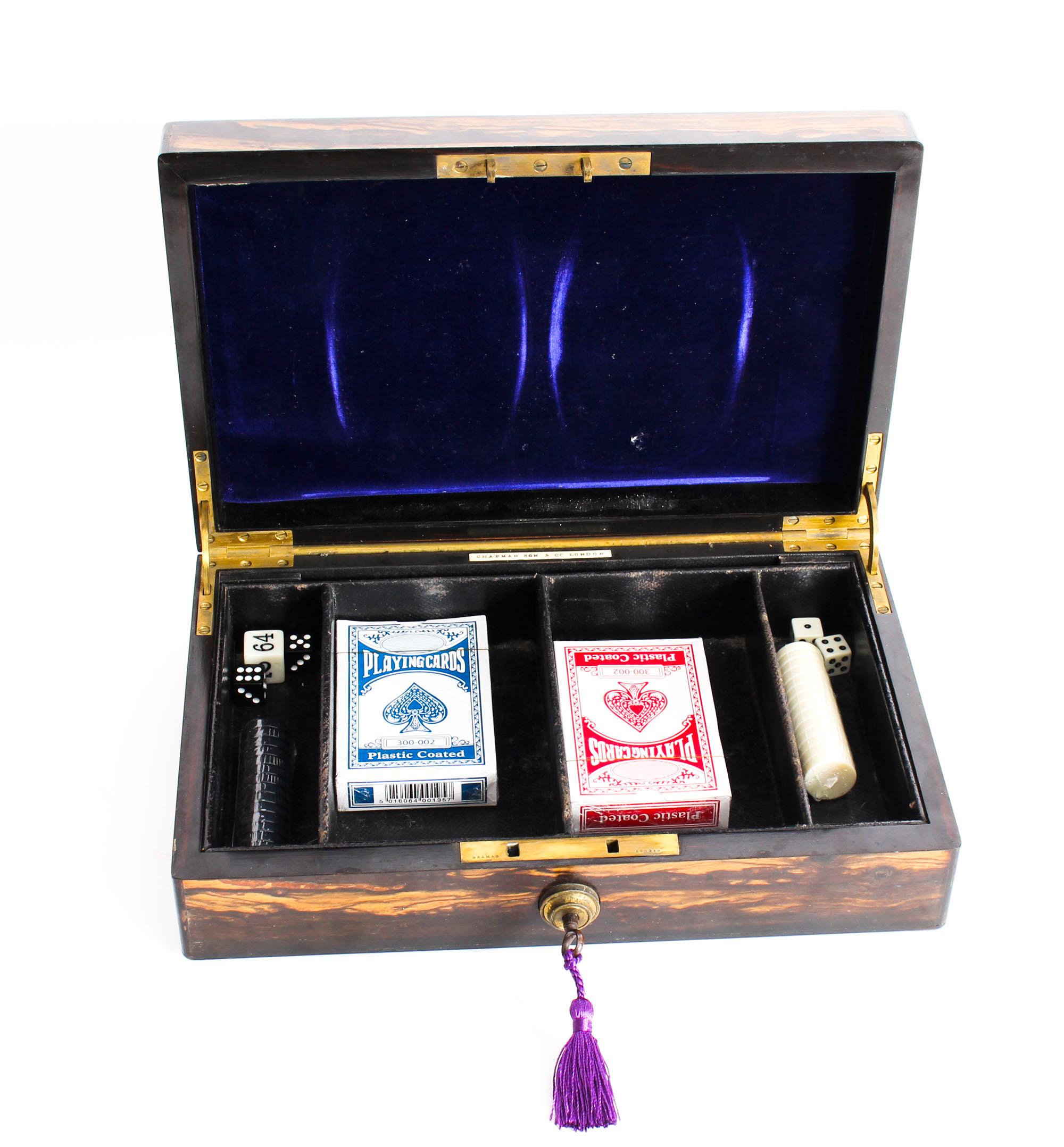 An elegant Victorian coromandel games box by the renowned Victorian retailer Chapman and Son & Co London, circa 1860 in date.

The rectangular top lifts up to real four fitted sections for cards and other games.

Complete with working Bramah
