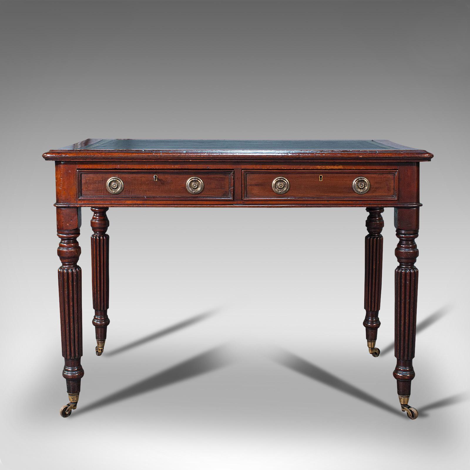 This is an antique correspondence desk. An English, mahogany and leather writing table, dating to the Regency period, circa 1820.

Fine example of a classic staple from the Regency period
Displays a desirable aged patina throughout
Select