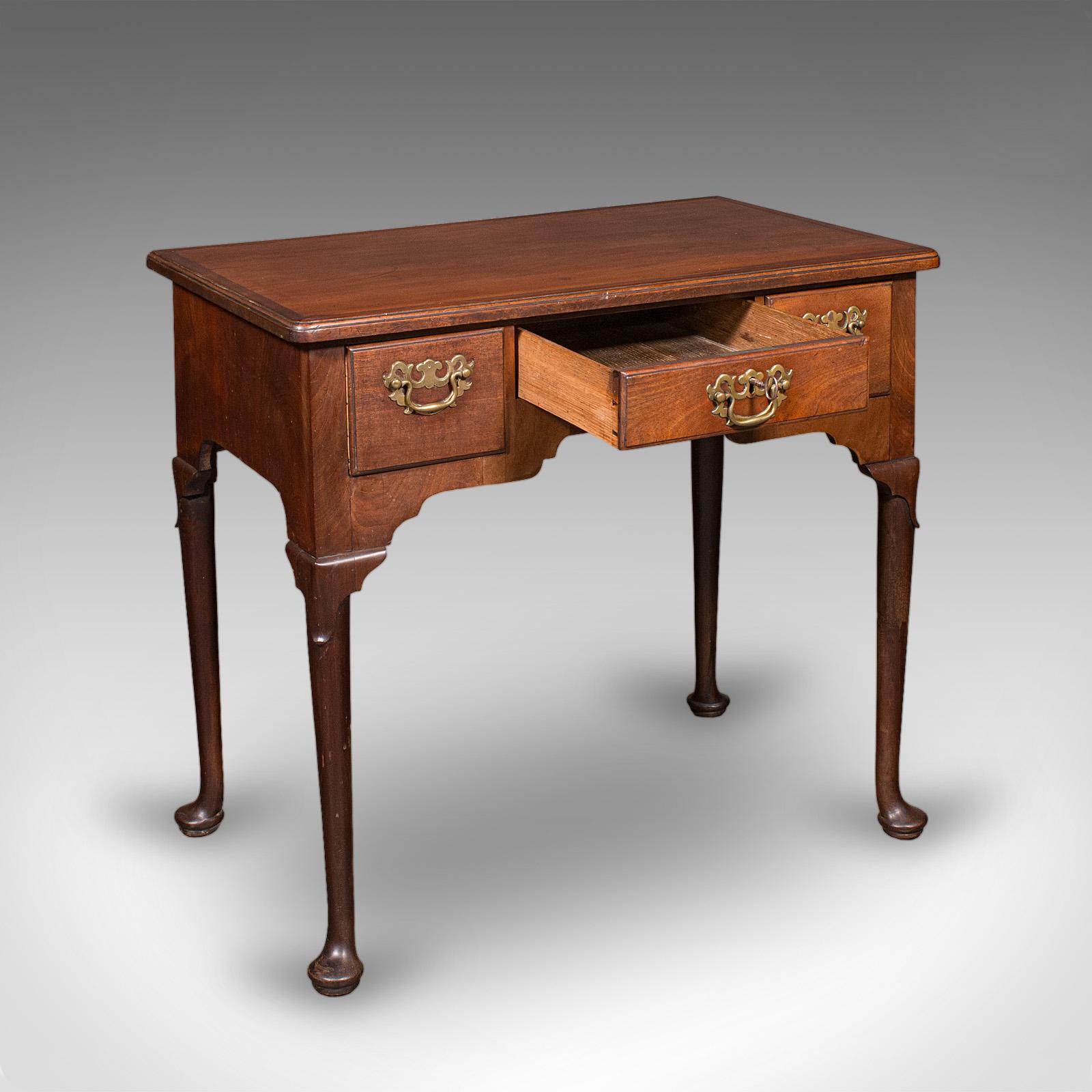 This is an antique correspondence table. An English, mahogany lowboy or writing desk, dating to the Georgian period, circa 1780. A charmingly original personal desk with excellent colour and craftsmanship.

Delightful Georgian writing table, ideal