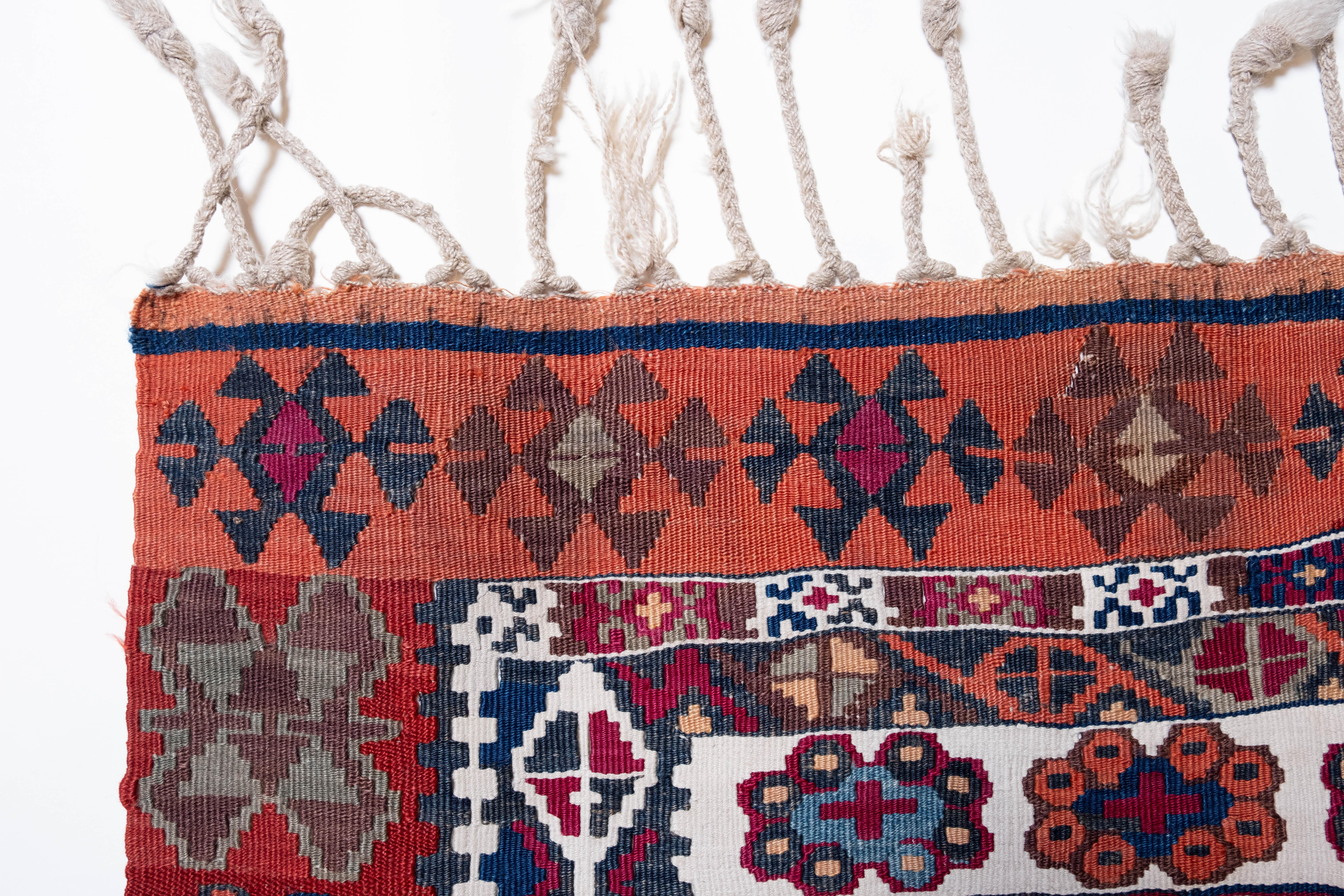 This is Central Anatolian Antique Kilim from the Corum region with a rare and beautiful color composition.

This highly collectible antique kilim has wonderful special colors and textures that are typical of an old kilim in good condition. It is a