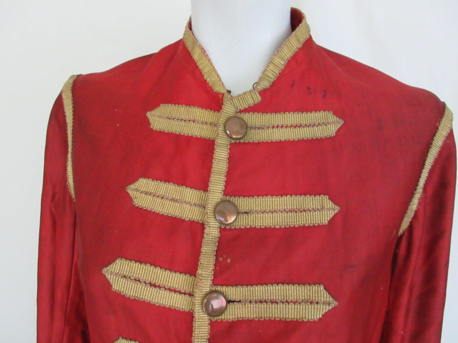 Unique Collectors-item/ Museum piece

We offer more vintage items, view our frontstore

Details:
Antique traditional coat Napoleon/military style. Theatrical made with golden tone details and buttons
Origin : France
Condition: worn with overall wear