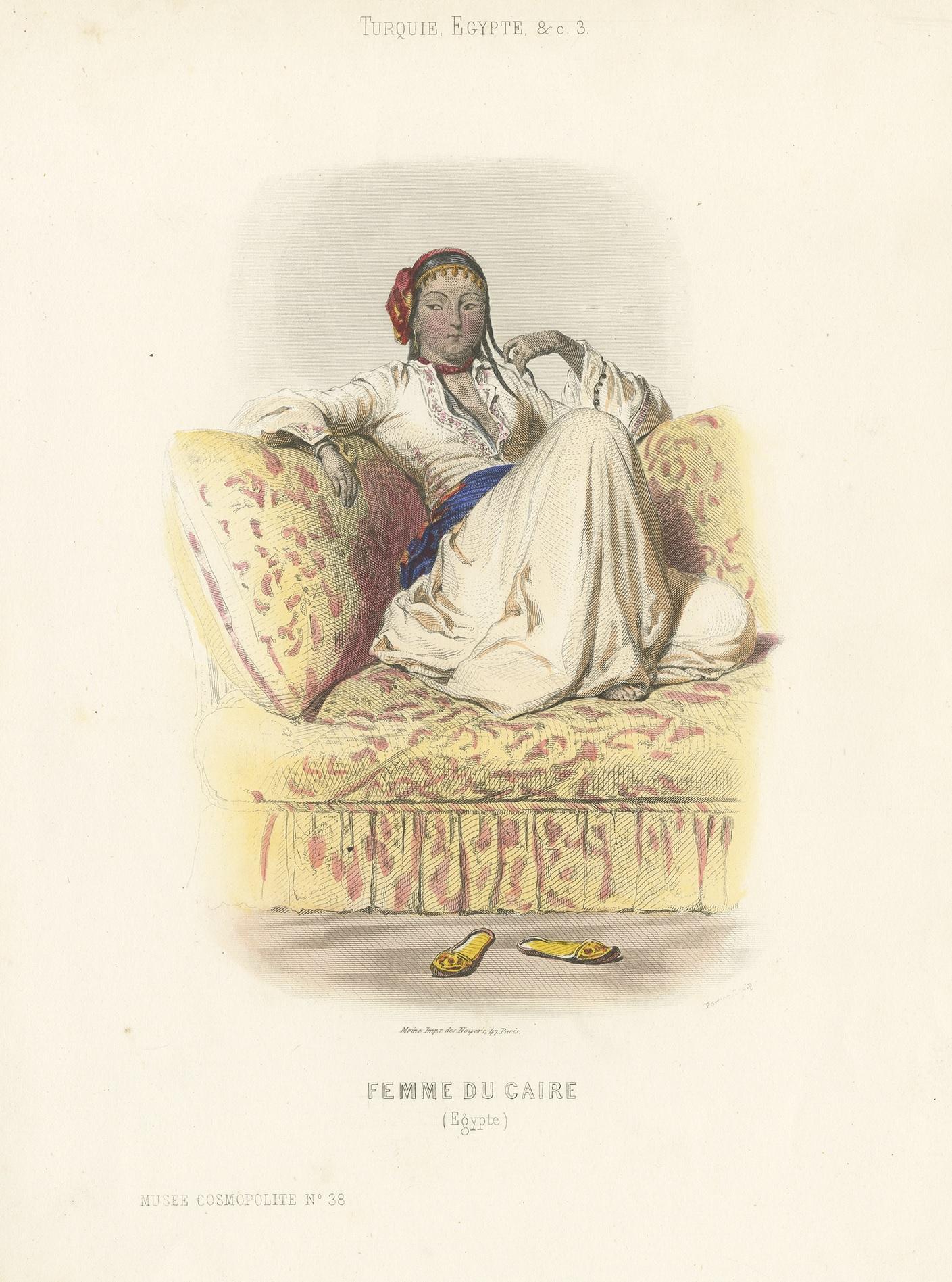 Antique costume print titled 'Femme du Caire (Egypt)'. Old print depicting a woman from Cairo, Egypt. This print originates from 'Costumes Moderne (Musée de Costumes). Published in Paris: Ancienne Maison Aubert.