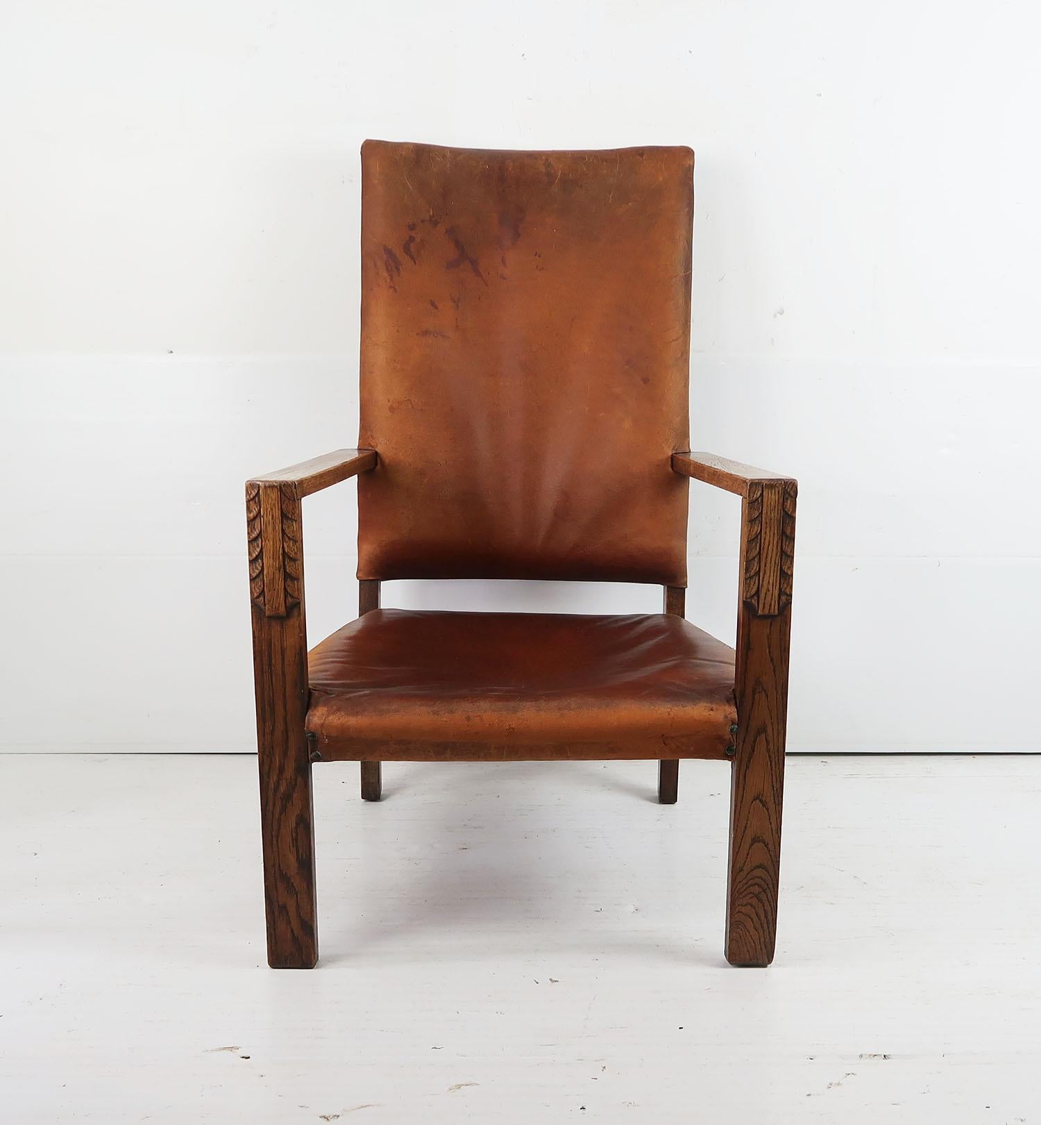 Carved Antique Cotswold School Style Leather Lounge Chair. English. C.1920