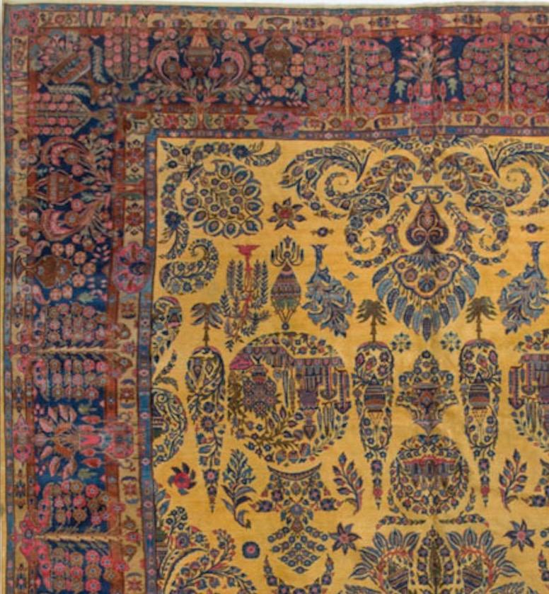 The splendid gold field gives this beautiful rug a richness that is complimented by the deep blue border. The floral motifs in the field are so cleverly composed and with the colors blends so well.