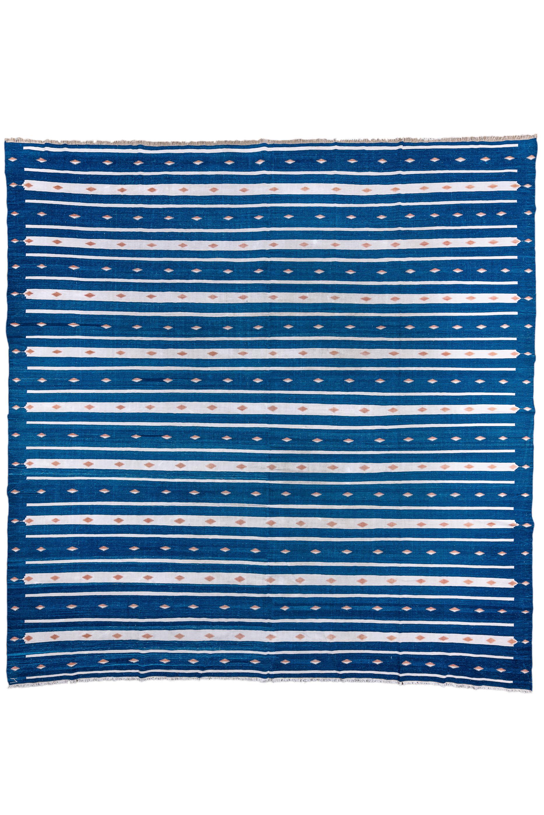 Classical Blue & White striped Indian Hand-Woven Dhurrie Rug. Antique all cotton flatweave carpet in excellent condition. 

Rug Measures
11x11'2.