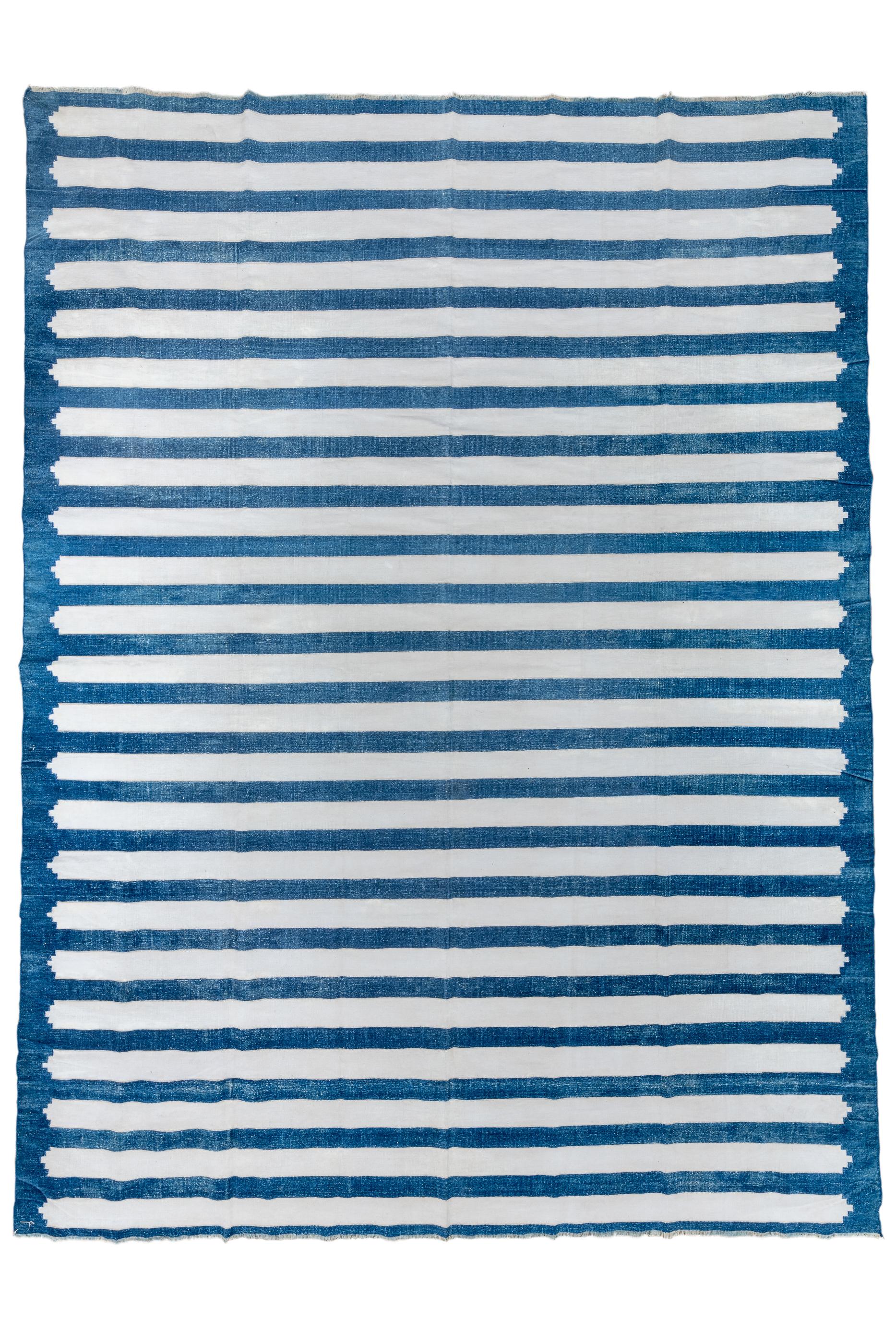 Classical blue and white striped Indian hand-woven Dhurrie rug.
Antique all cotton flatweave carpet in excellent condition.
Rug Measures
10'6x14