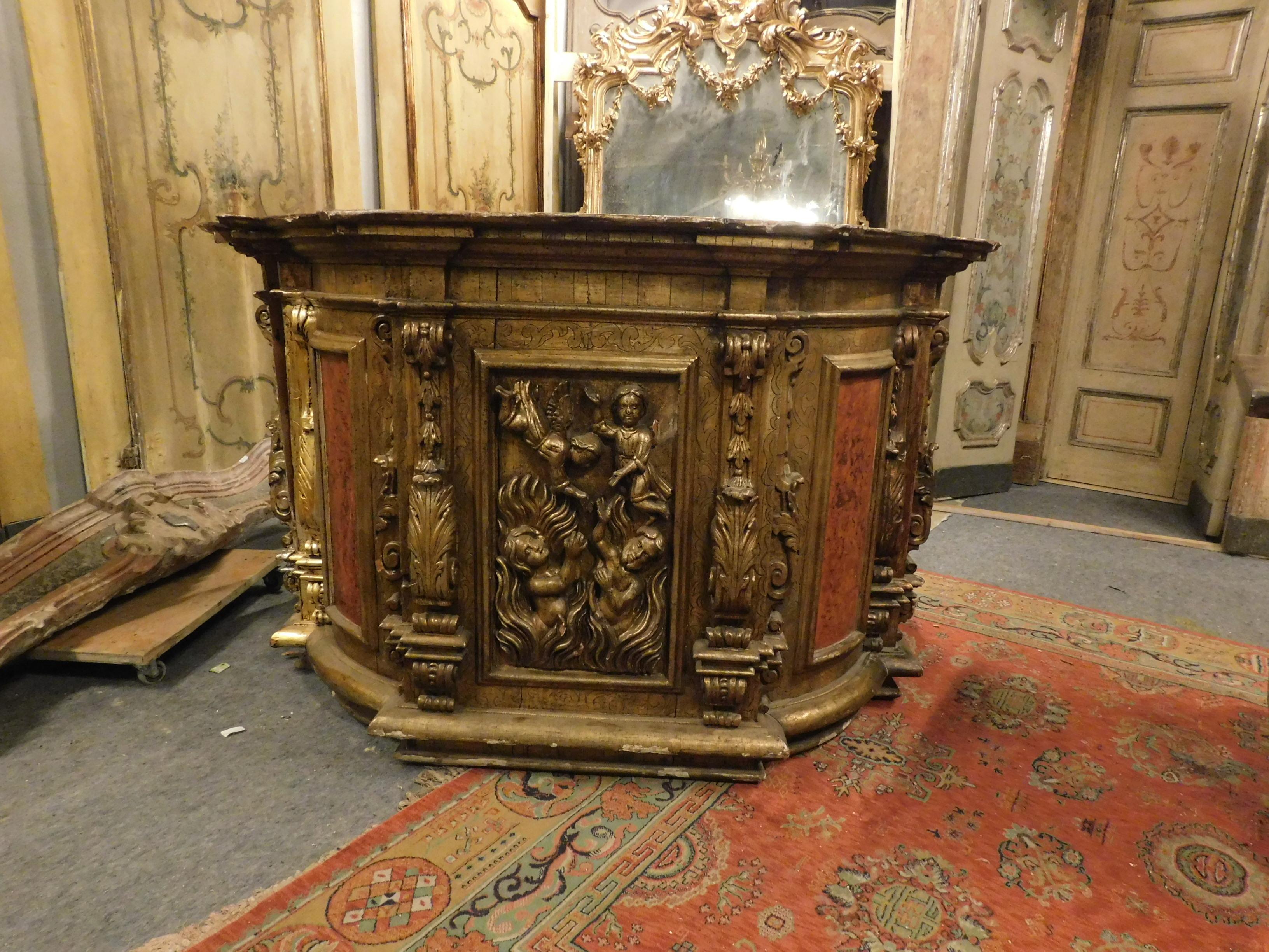 Ancient church pulpit in larch wood, silvered, gilded and richly carved by hand, built in the middle of the 16th century for an important church in Naples (Italy).
Beautiful sculpture with representation of hell and heaven, very rich sculpture and