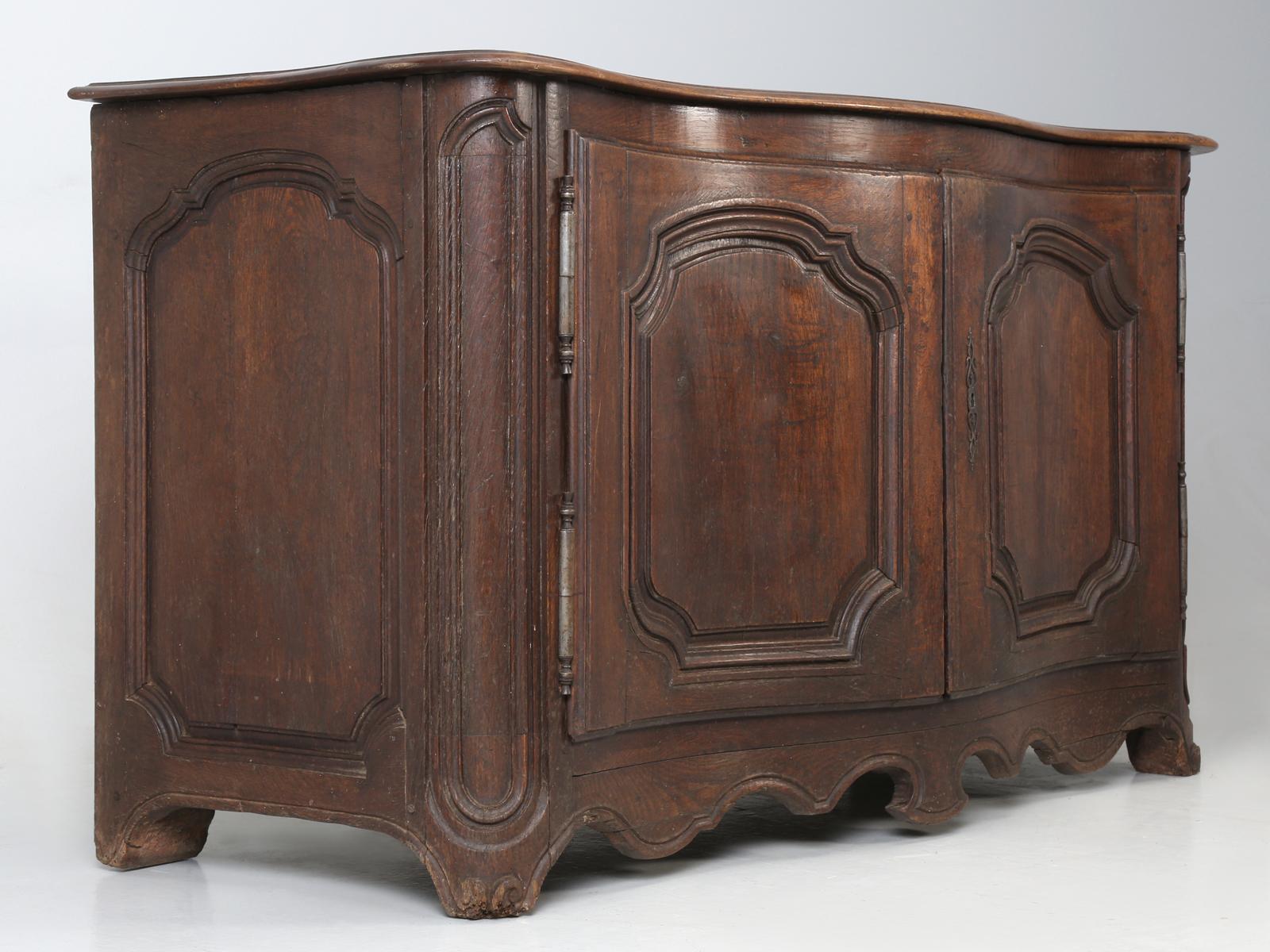 When you are an old seasoned antique dealer, every once in a while, something comes in the door and screams, take me home! This 18th century French walnut serpentine buffet had me measuring every wall in the house, to see if it would squeeze in