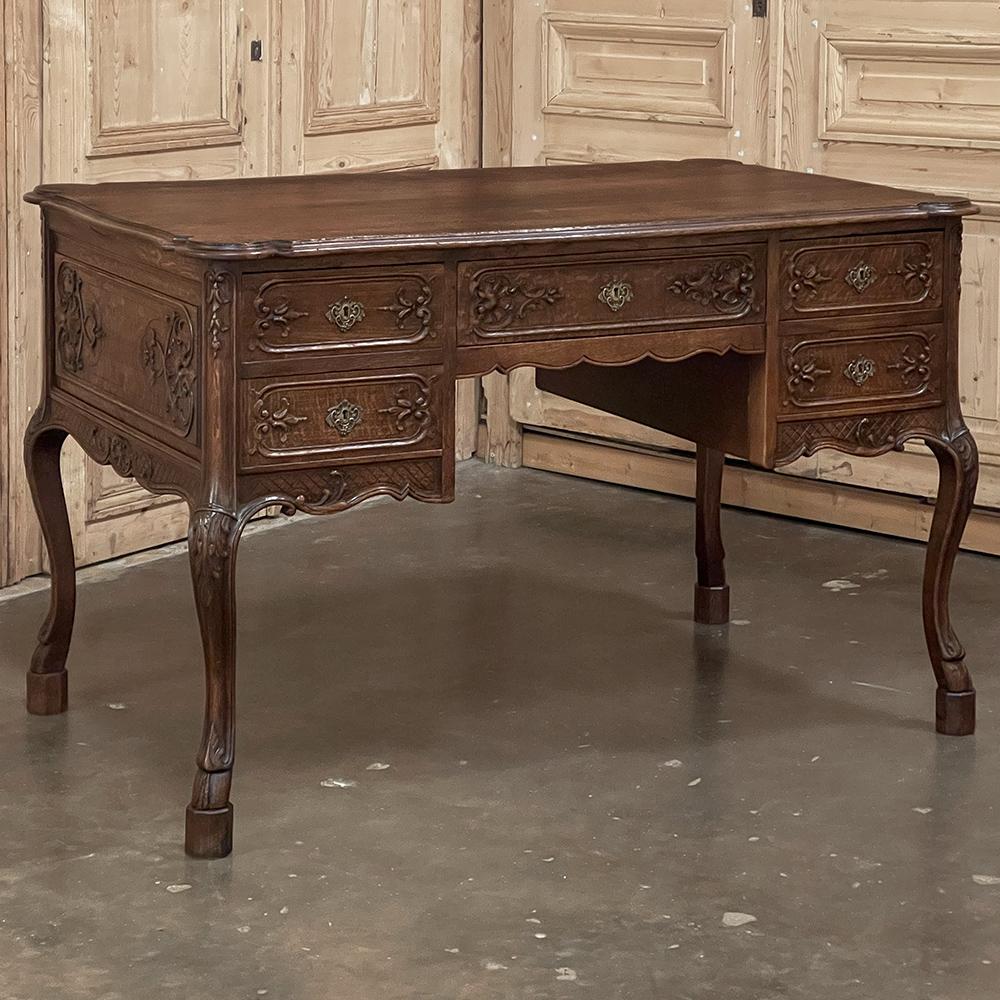 Antique Country French Double-Faced Desk was crafted by master artisans creating a superlative choice for any office!  Finished on all four sides, it can be placed anywhere in the room, even the center.  The contoured and double beveled top provides