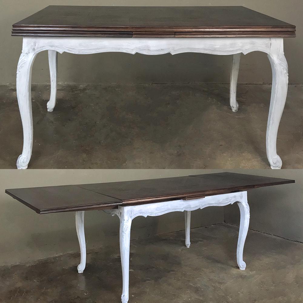 Antique Country French draw leaf painted or stained dining table features beautifully carved oak with cabriole legs, parquet top and leaves that draw in and out with ease! The lower apron and cabriole legs feature a lovely patinaed painted finish