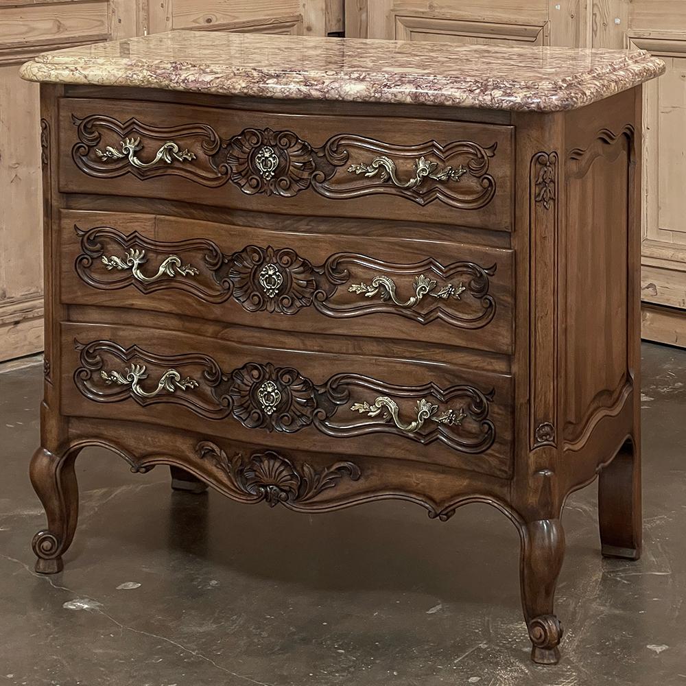 Antique Country French Louis XIV Walnut Marble Top Commode will make a splendid addition to any room!  Combining the charm of Country French flair with the regal nature of Louis XIV styling and ornamentation, it features a subtly bowed front which