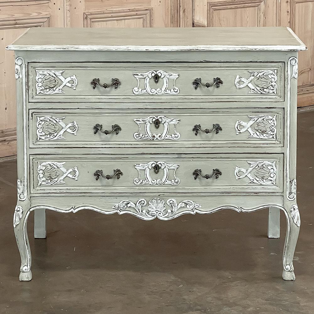 Antique Country French Painted Commode will make a charming addition to any casual decor! Crafted from a variety of woods, it features a two-toned painted finish that highlights the carved detail that appears on each cornerpost, the scrolled legs