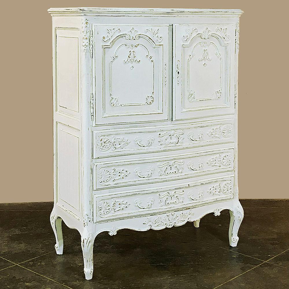 Antique Country French Provincial painted cabinet ~ wardrobe provides a double door cabinet above with three spacious drawers below for the ultimate in stylish functionality! Patinaed painted finish with subtle distressing accentuates the carved