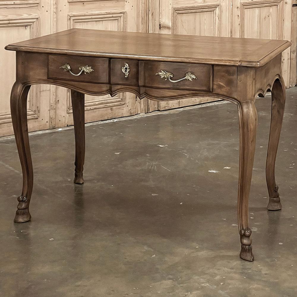 Antique Country French Walnut Desk ~ Writing Table is a classic piece with understated elegance that is perfect for completing a home office, serve as a vanity table, or even behind a sofa.  Crafted from fine walnut, it features a rectangular