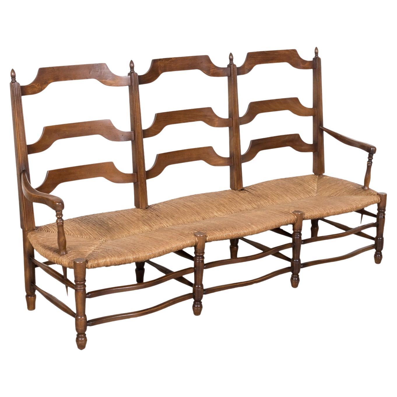 Antique Country French Walnut Ladder Back Settee or Radassier with Rush Seat For Sale