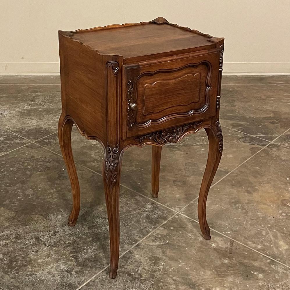 Antique country French walnut nightstand ~ end table was fashioned from solid sumptuous walnut, and features a classic provincial charm that cannot be denied! A subtle scalloped edge surrounds the top and helps keep things anchored there. The