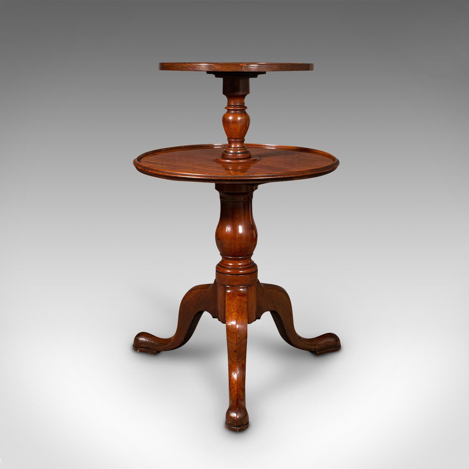 This is an antique country house dumb waiter. An English, mahogany 2-tier serving table, dating to the Georgian period, circa 1780.

Classic elegance and craftsmanship to this charming Georgian stand
Displays a desirable aged patina and in good