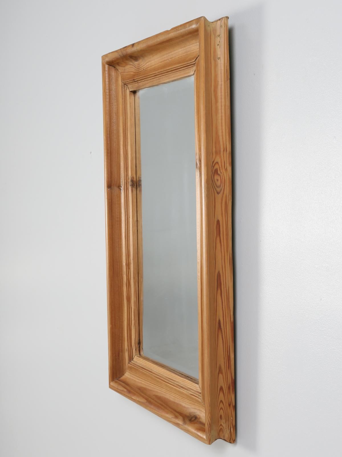 Old Country pine mirror that was removed from a home in Italy, although we are now sure it was made in Italy. Please look at 1stdibs item number LU824311588913, for this was the chest or dresser that the mirror hung over.

 