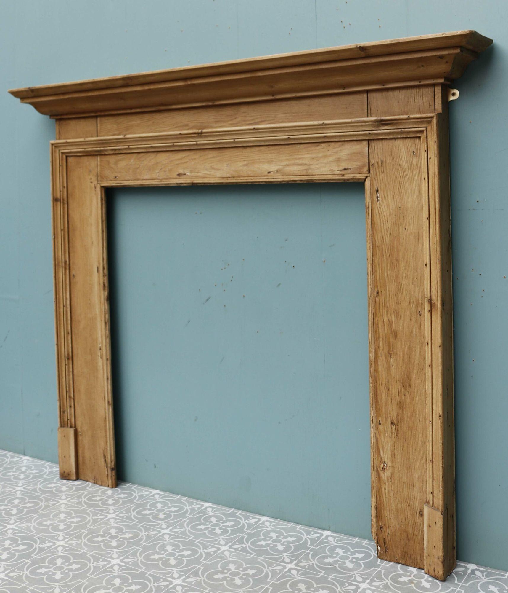A simple and elegant pine fire mantel.
 
Additional Dimensions 
Opening Height 95.5 cm
Opening Width 89.5 cm
Width Across the Foot-blocks 131 cm.
