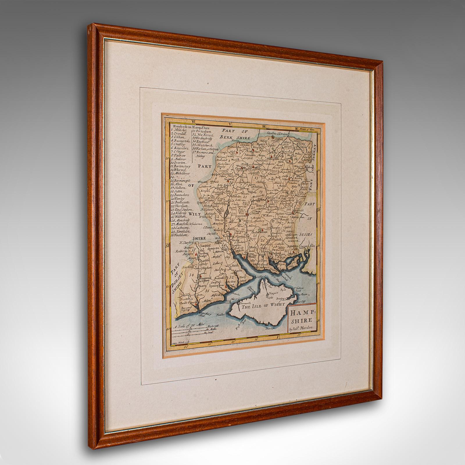 
This is an antique county map of Hampshire. An English, framed atlas engraving of cartographic interest By Robert Morden, dating to the late 17th century and later.

Superb lithography of Hampshire and its county detail, perfect for