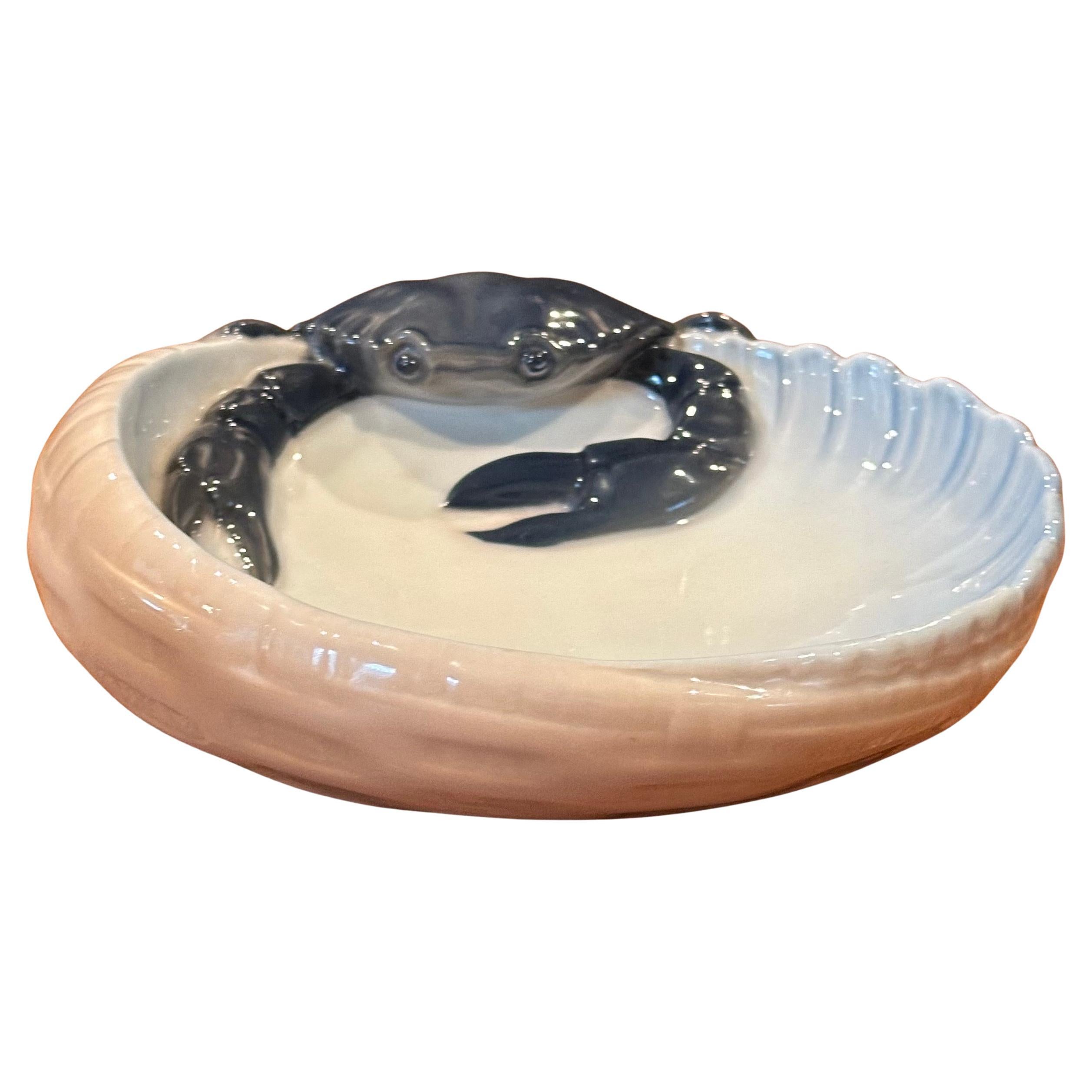 Wonderful antique crab bowl by Jorgen Balslov for Royal Copenhagen, circa 1920s. The dark blue, grey and white glazed stoneware bowl with abstract crab design  signed and marked accordingly #3131 on the underside.  The Royal Copenhagen mark dates to