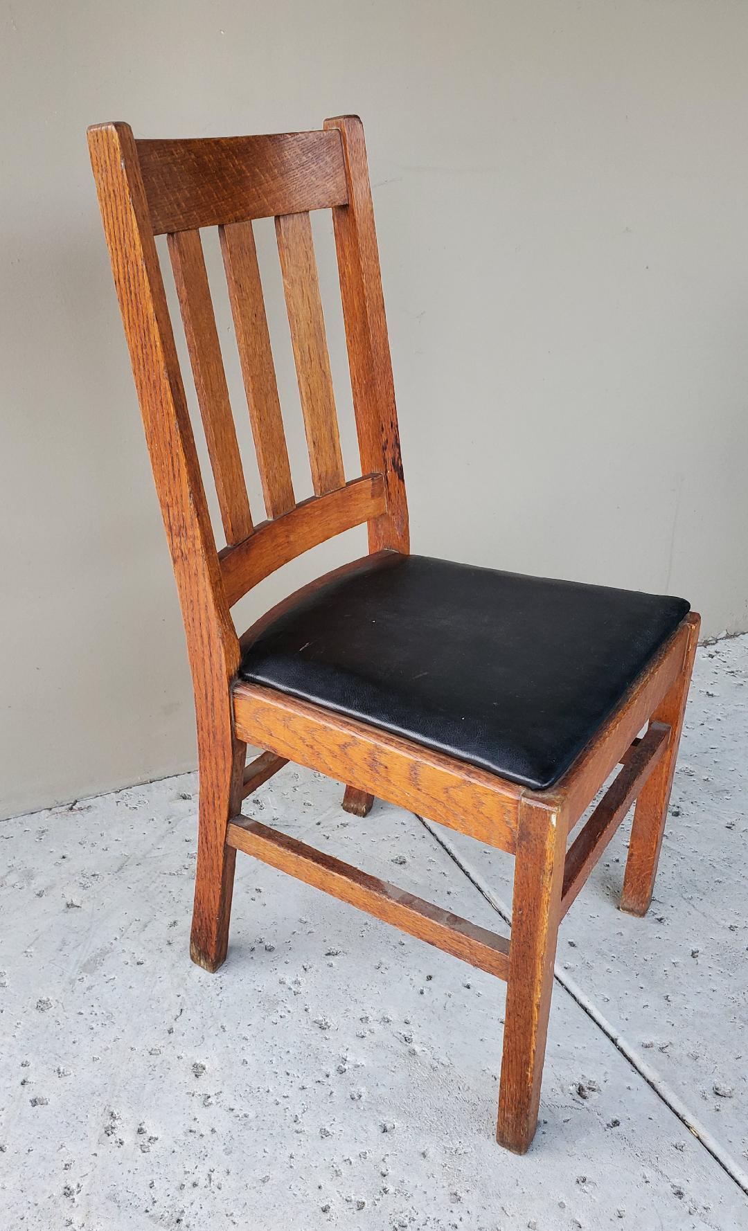 This Is An Antique Craftsman Quarter Sawn Oak Or Tiger Oak Wood Single Dining Chair or Single Desk Chair With An Upholstered Black Vinyl Seat.
The Tiger Oak Or Quarter Sawn Oak Wooden Chair Is In Really Good Condition All Around With Original